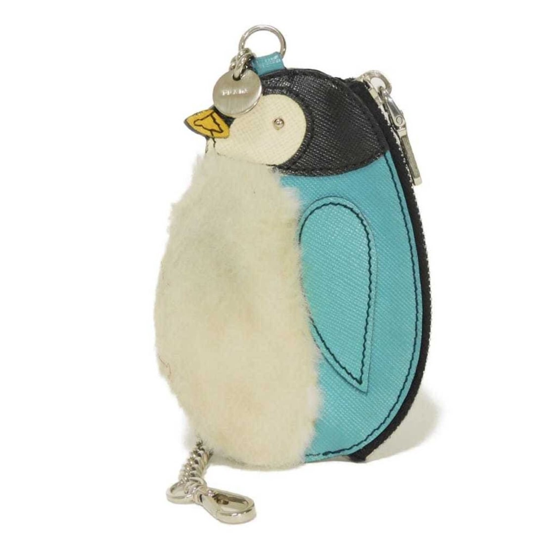Prada Saffiano Penguin Chain Coin Purse with Calf Fur Logo Medallion (Voyage) - 1ARE87 2APJ F072P: --- Catalog ---Category: SizeSize (HxWxD): 12cm x 8cm x 1cm / 4.72'' x 3.14'' x 0.39''Category: DesignType: Coin purse/coin caseColor: BlueGender: Men,WomenMaterial: Fur , Saffiano Category: GeneralMP