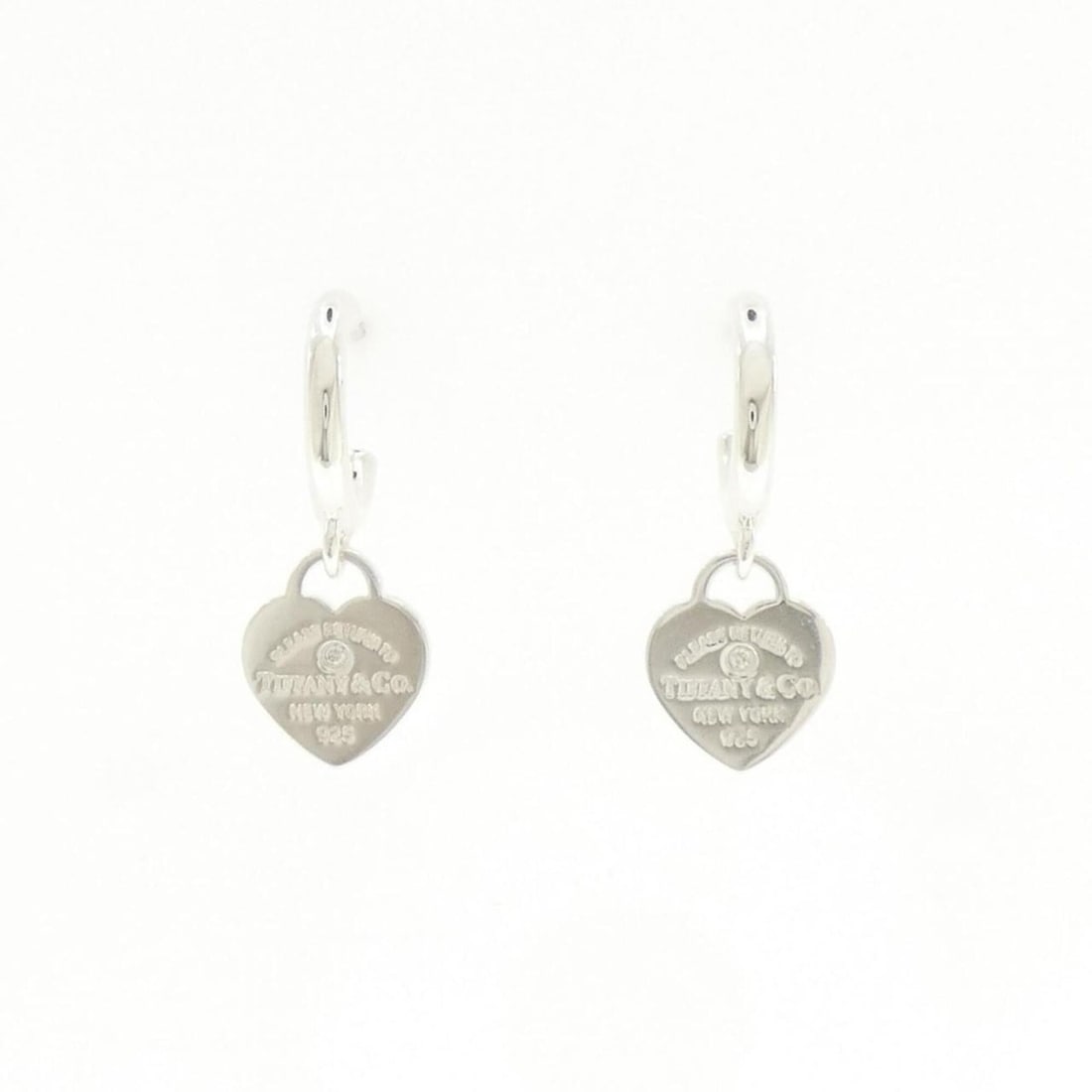 Tiffany & Co. Return to Hoop Mini Earrings: --- Catalog ---Category: SizeSize (HxWxD): 25.50mm x 10.00mm / 1.00'' x 0.39''Category: DesignType: Half hoop earringsColor: SilverStone: DiamondGender: WomenMaterial: Silver 925Category: GeneralMPN:
