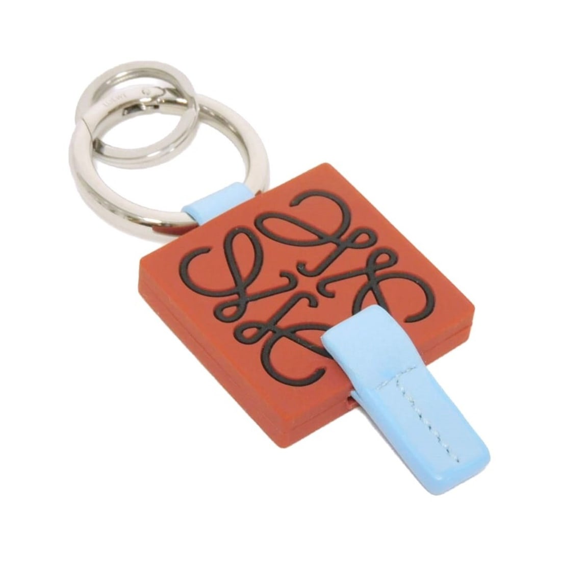 Loewe Anagram Rubber Plaque Keyring Keychain, Calfskin, Blue/Black, Square Bag Charm, Silicone,: --- Catalog ---Category: SizeSize (HxWxD): 9.5cm x 4cm x 8.00mm / 3.74'' x 1.57'' x 0.31''Category: DesignType: KeyringColor: Black, Blue, BrownGender: Men,WomenCategory: GeneralBrand: Loewe--- Item