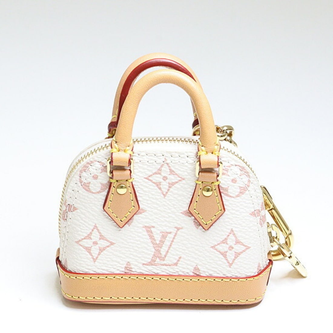 Louis Vuitton Bag Charm Micro Alma Monogram Dune Blanc M01883 Keychain: --- Catalog ---Category: SizeSize (HxWxD): 88.00mm x 80.00mm x 38.00mm / 3.46'' x 3.15'' x 1.50''Category: DesignType: Handbag charmColor: BlancGender: WomenMaterial: Canvas, Leather,