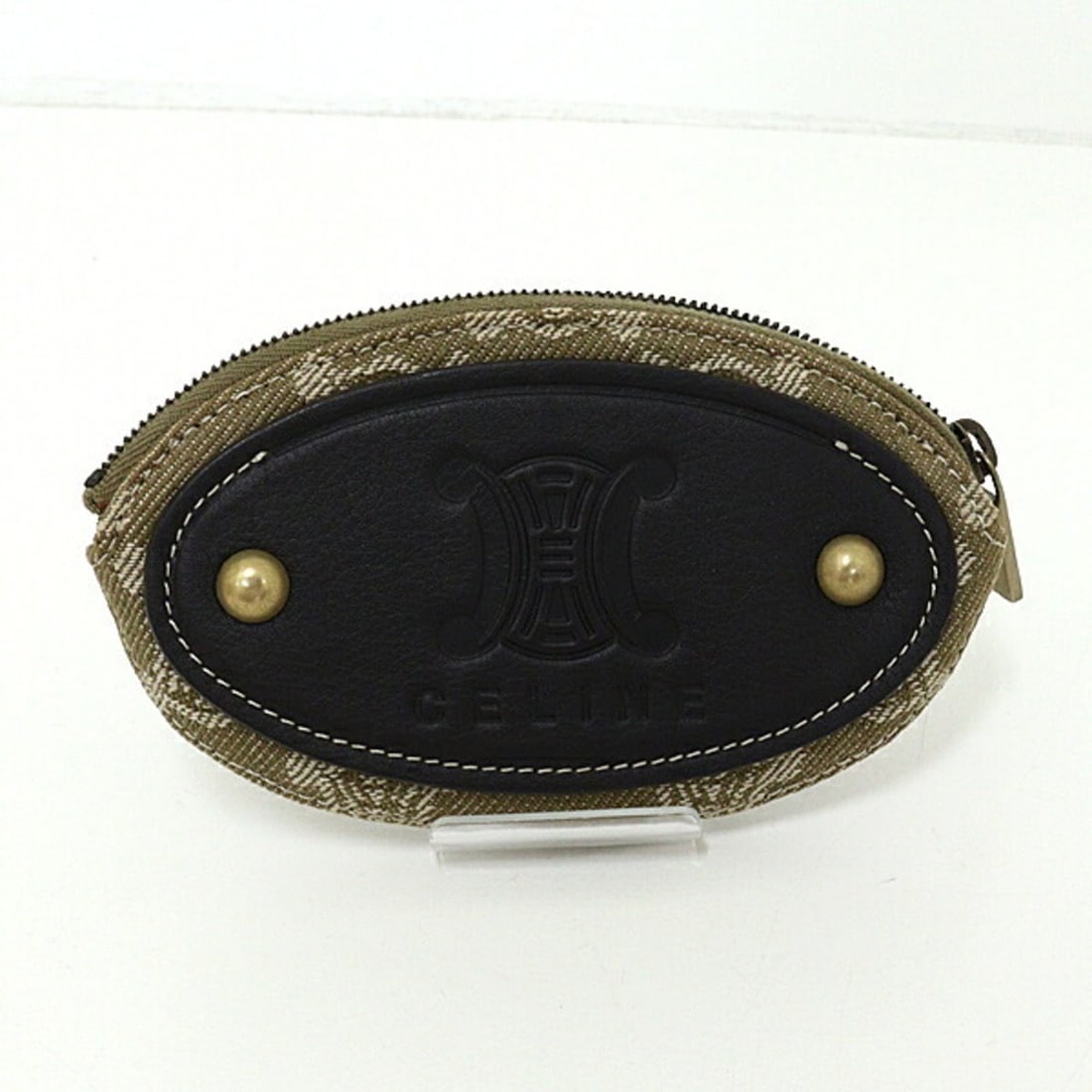 Celine Macadam Coin Case Keyring: --- Catalog ---Category: SizeSize (HxWxD): 13cm x 7.5cm x 1.4cm / 5.11'' x 2.95'' x 0.55''Category: DesignType: Coin purse/coin caseColor: Beige, KhakiGender: Women,MenMaterial: Leather , Cotton Categ