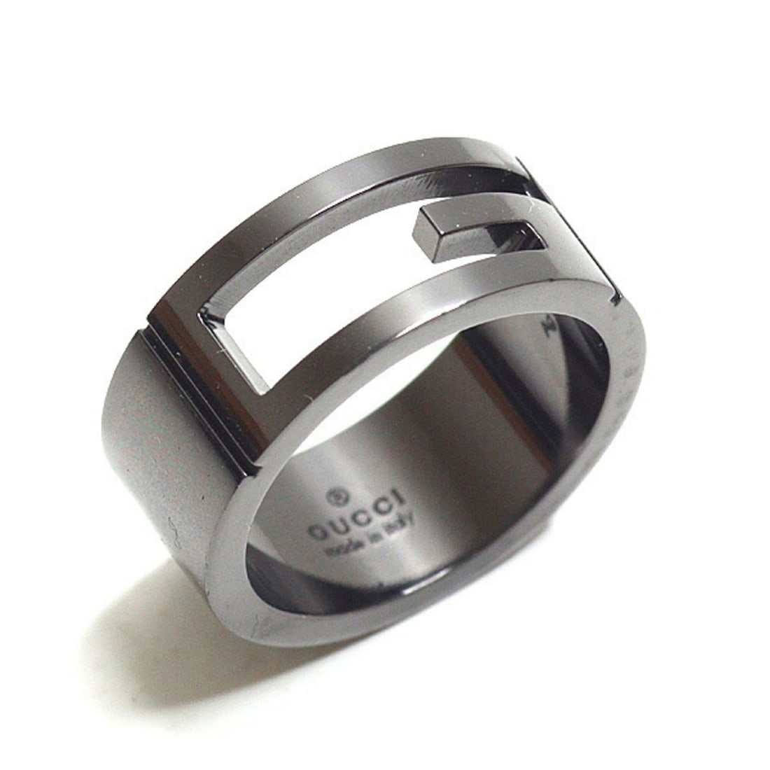 Gucci Branded G Ring, Sterling Silver, Black Ruthenium (Ag925), Size #11 (Actual size: US 10.5): --- Catalog ---Category: SizeJP Size: 10.5US Size: 5.5Category: DesignType: Band ringGender: Women,MenMaterial: Ruthenium, Sterling silver 925Category: GeneralBrand: GucciCountry of Origin: Italy---