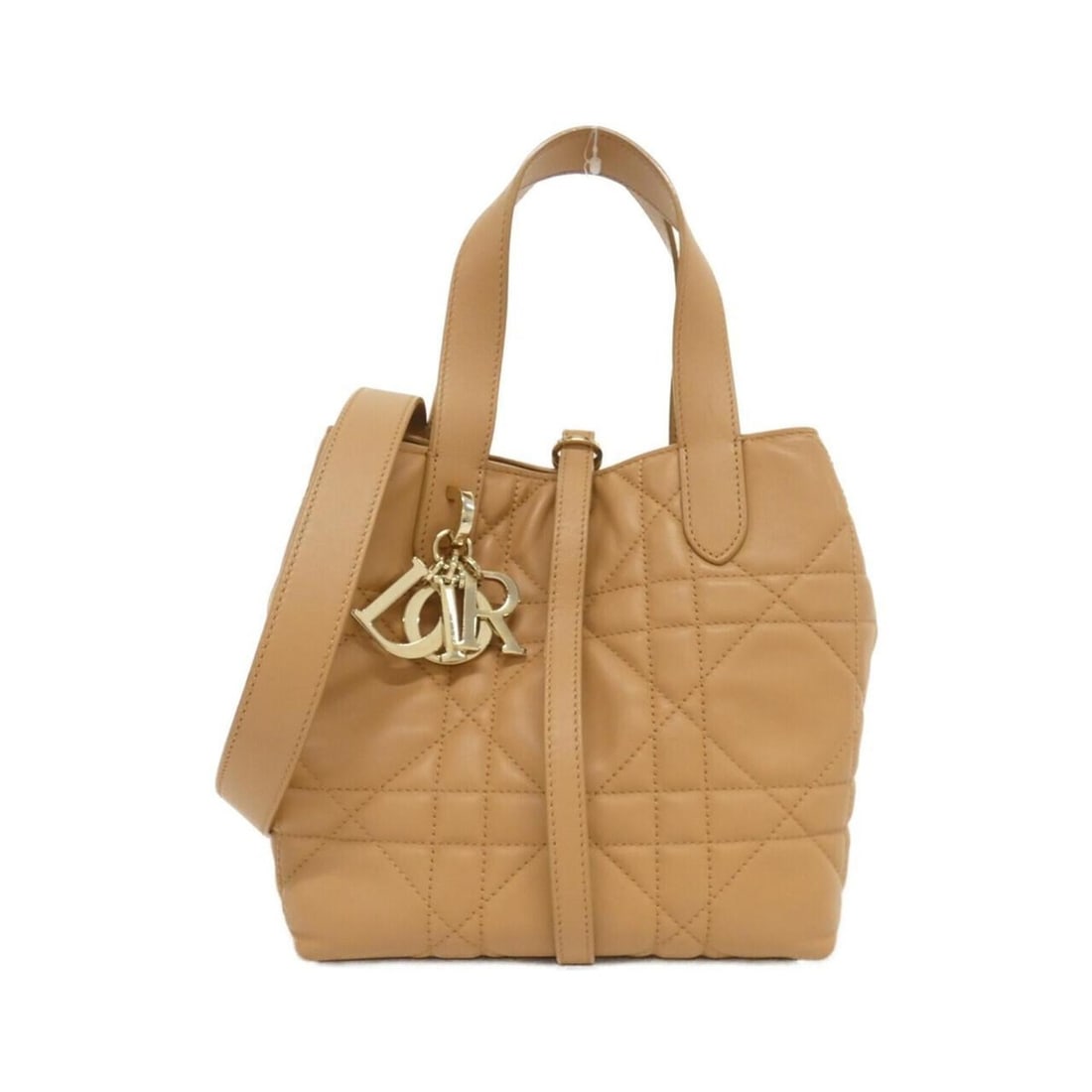 Christian Dior Toujours Vertical Tote Small M2835OSNW Handbag: --- Catalog ---Category: SizeSize (HxWxD): 18cm x 18cm x 12cm / 7.08'' x 7.08'' x 4.72''Category: DesignType: HandbagColor: BrownGender: Men,WomenMaterial: Leather Hardware Color: GoldLeather/Fur Type