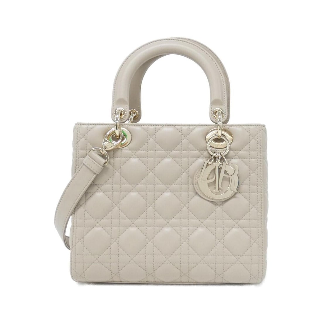 Christian Dior Lady Medium M0565ONGE Handbag: --- Catalog ---Category: SizeSize (HxWxD): 20cm x 24cm x 12cm / 7.87'' x 9.44'' x 4.72''Category: DesignType: HandbagColor: BeigeGender: WomenMaterial: Leather Hardware Color: GoldLeather/Fur Type: La