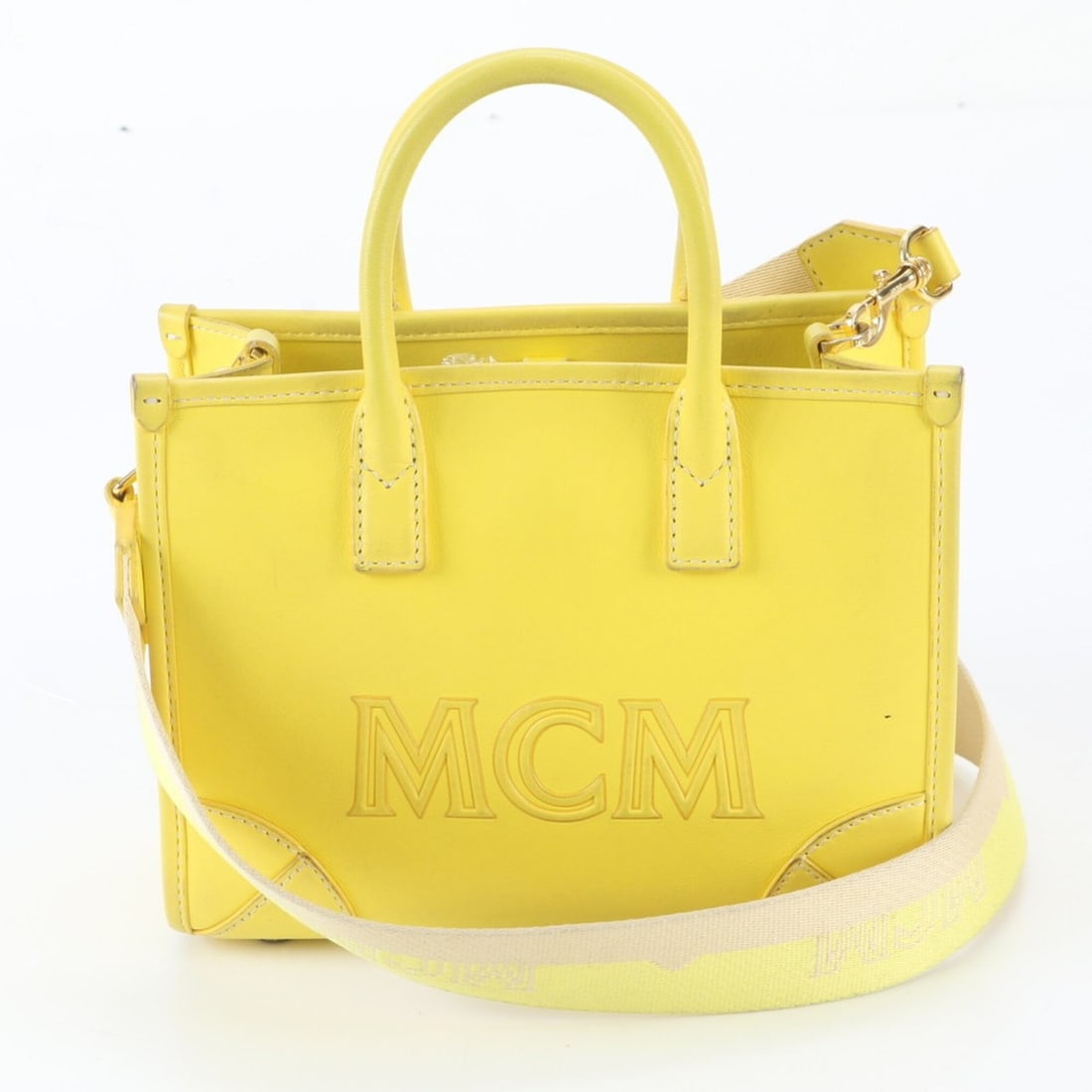 MCM Munich Mini Leather 2-Way Shoulder Bag, Handbag, Tote Bag for Women: --- Catalog ---Category: SizeSize (HxWxD): 15cm x 20cm x 9cm / 5.9'' x 7.87'' x 3.54''Category: DesignType: Handbag, Shoulder bag, Tote bagColor: YellowGender: WomenMaterial: Leather Category: General