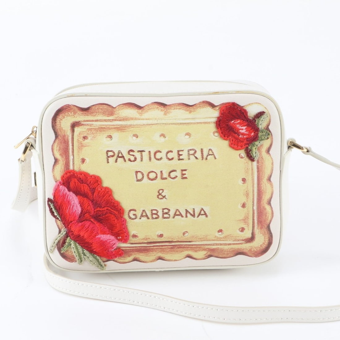 Dolce & Gabbana PASTICCERIA Flower Embroidered Leather Shoulder Bag for Women: --- Catalog ---Category: SizeSize (HxWxD): 12cm x 16cm x 5cm / 4.72'' x 6.29'' x 1.96''Strap Length: 111cm / 43.7''Category: DesignType: Shoulder bagColor: Ivory, Multi-colorGender: WomenMaterial: Lea