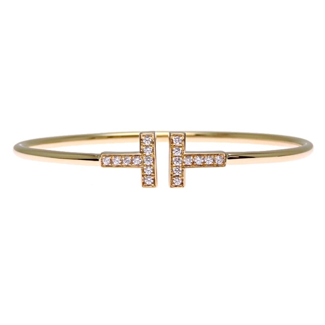 Tiffany & Co. 18K Yellow Gold T Diamond Wire Bracelet for Women and Men: --- Catalog ---Category: SizeLength: 15.5cm / 6.1''Category: DesignType: Charm braceletStone: DiamondGender: Men,WomenMaterial: Yellow gold (18K)Category: GeneralBrand: Tiffany--- Item List ---Section