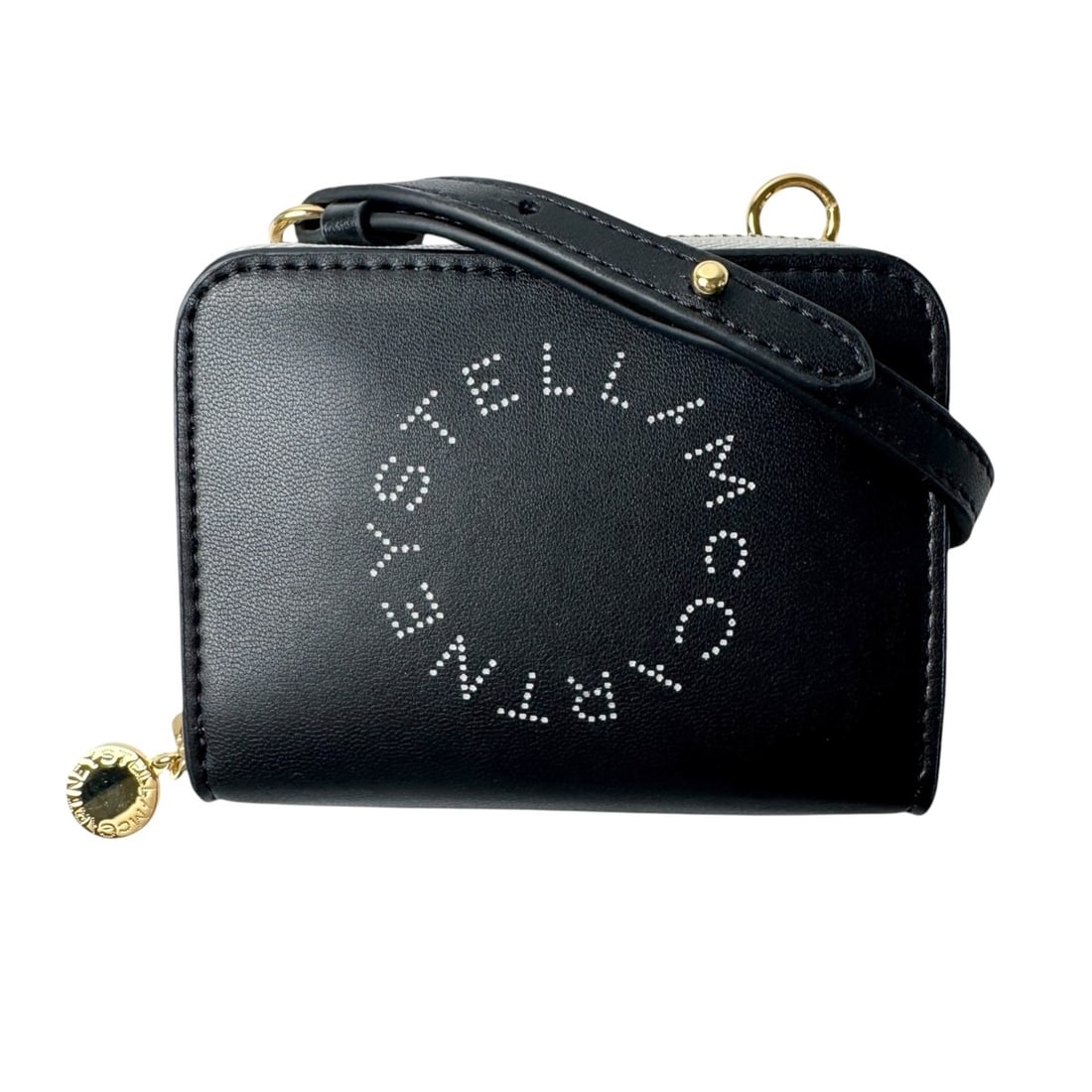 Stella McCartney STELLA McCARTNEY Zip-around business card holder/card case with strap, black, for: --- Catalog ---Category: DesignType: Card caseColor: Beige, BlackGender: WomenMaterial: Leather Category: GeneralBrand: Stella McCartneyCategory: Physical PropertiesSize (HxWxD): 8cm x 10cm / 3.14'' x