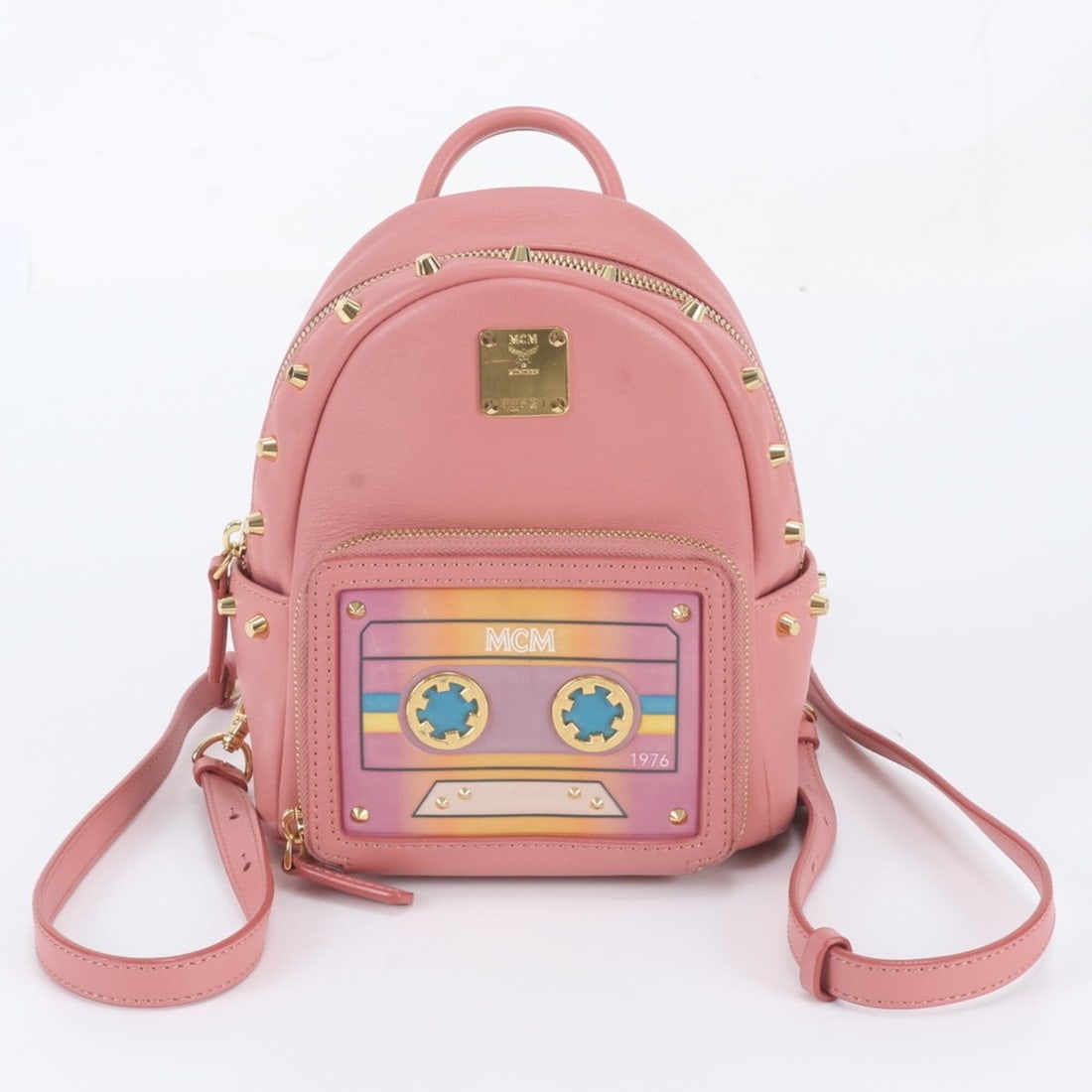 MCM Cassette Studded Leather Backpack Shoulder Bag for Women: --- Catalog ---Category: SizeSize (HxWxD): 20cm x 17cm x 8cm / 7.87'' x 6.69'' x 3.14''Category: DesignType: Shoulder bagColor: PinkGender: WomenMaterial: Leather Category: GeneralBrand: MCM--- Item L