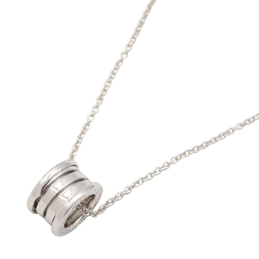 BVLGARI B-zero1 Necklace, 18KWG (White Gold), Silver Tone, for Men and Women, Item Number 352815: --- Catalog ---Category: SizePendant Size: 14.4mm x 9mm / 0.56'' x 0.35''Neck Circumference: 40.5 cm / 15.94''Category: DesignColor: SilverGender: Men,WomenMaterial: White gold (18K)Necklace Type: Nec