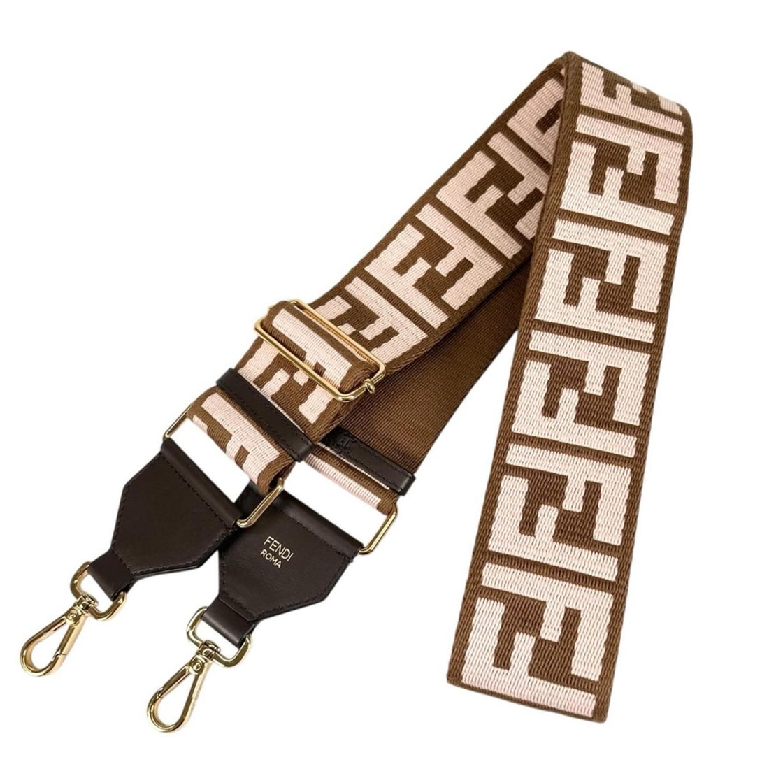 FENDI FF Logo Strap You Shoulder Canvas Leather Brown Pink Women's: --- Catalog ---Category: SizeSize (HxWxD): 134cm x 6cm / 52.75'' x 2.36''Category: DesignType: StrapColor: Brown, PinkGender: WomenMaterial: Canvas, LeatherCategory: GeneralBrand: FendiCountry of Orig