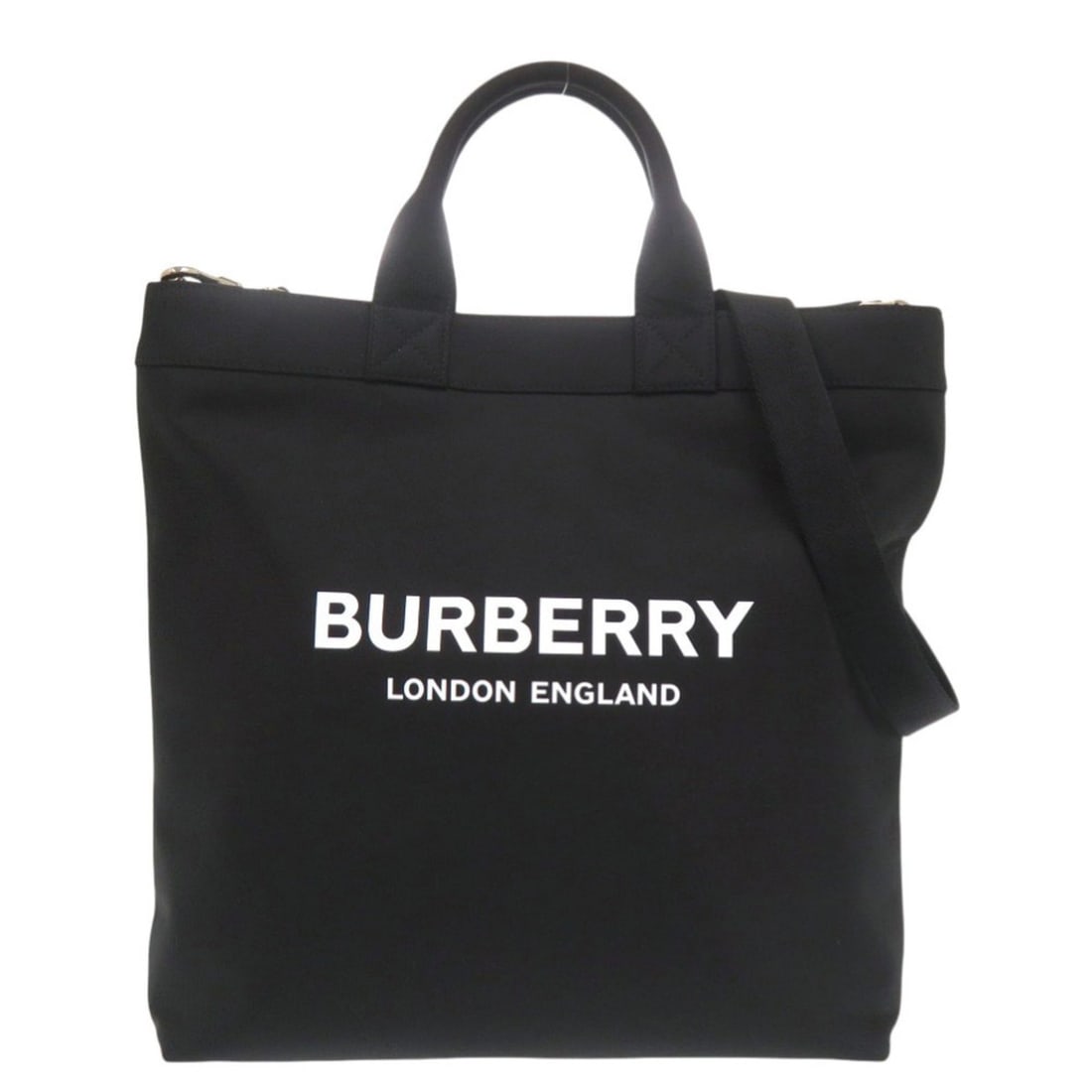Burberry Logo Black Nylon 2-Way Tote Bag (Black) 0410BURBERRY: --- Catalog ---Category: SizeSize (HxWxD): 36cm x 34cm x 8cm / 14.17'' x 13.38'' x 3.14''Category: DesignType: Tote bagColor: BlackGender: MenMaterial: Nylon Category: GeneralBrand: BurberryCountry of