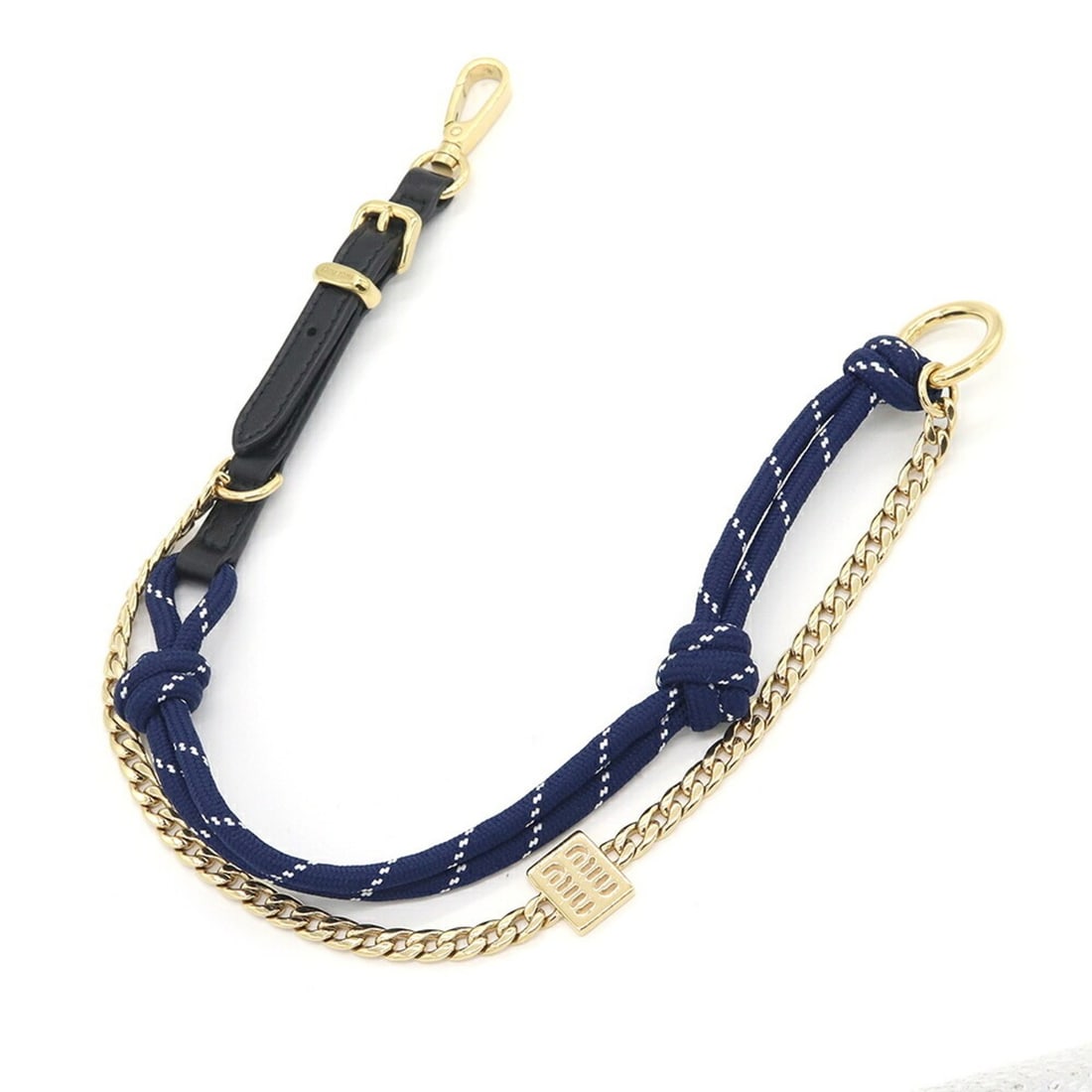 Miu Miu Miu Accessory Bag Charm 5TL510 Navy Gold Cord Metal Calf Leather Keychain Keyring Chain: --- Catalog ---Category: SizeWeight: 67.6g / 2.38oz.Ring Diameter: 2.7cm / 1.06''Category: DesignType: KeyringColor: Gold, NavyGender: WomenMaterial: Leather, MetalLeather/Fur Type: CalfskinCategory: 