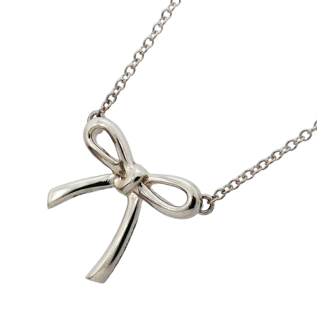 Tiffany & Co. Bow Ribbon Necklace, Sterling Silver 925, Women's: --- Catalog ---Category: SizePendant Size: 14mm x 14.4mm / 0.55'' x 0.56''Neck Circumference: 40.5 cm / 15.94''Category: DesignGender: WomenMaterial: Silver 925Necklace Type: NecklaceCategory: General