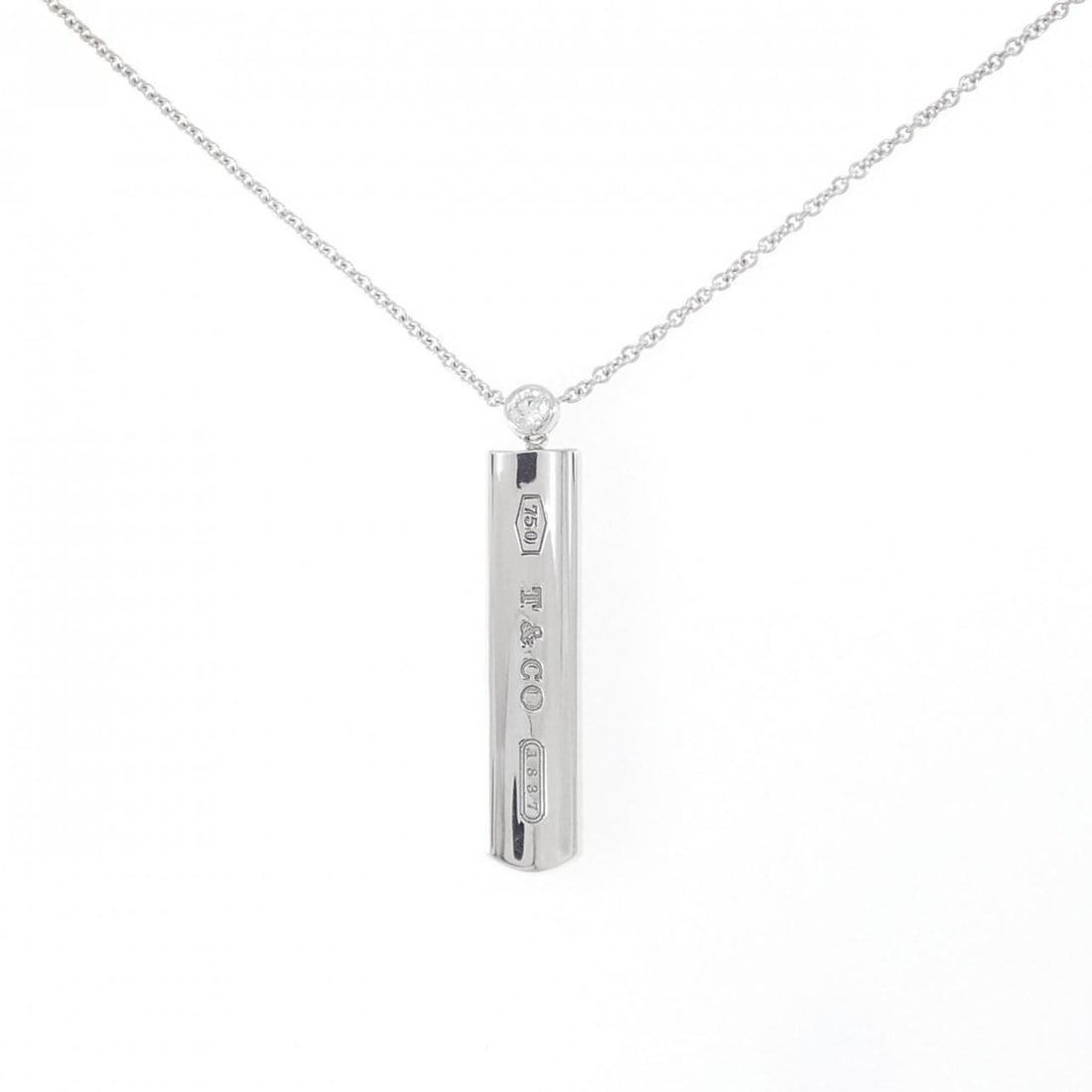 Tiffany & Co. 1837 Necklace: --- Catalog ---Category: SizePendant Size: 41.5mm x 8.2mm / 1.63'' x 0.32''Neck Circumference: 46 cm / 18.11''Category: DesignGender: WomenMaterial: White gold (18K)Pendant Type: PendantNecklace