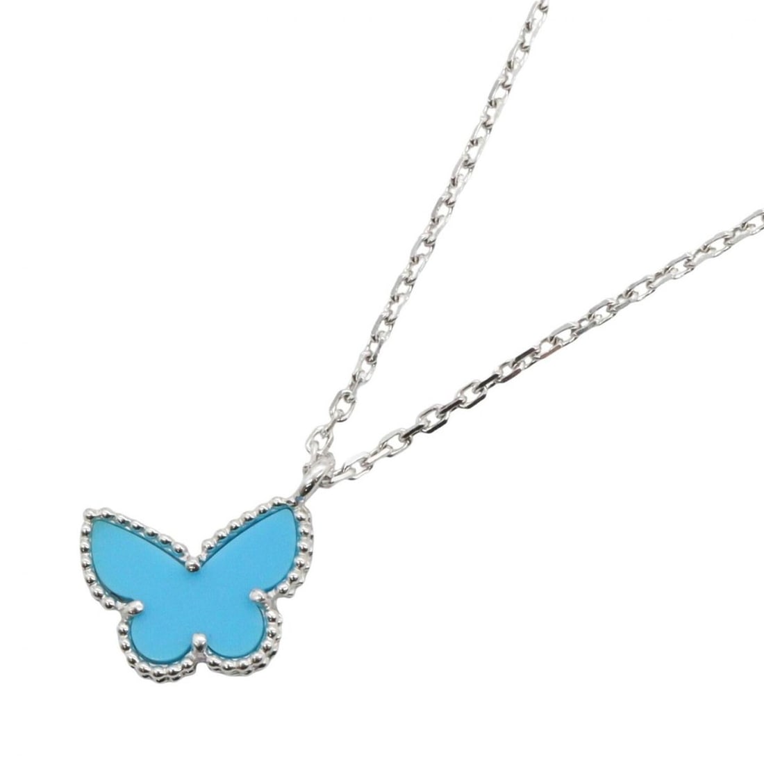 Van Cleef & Arpels Sweet Alhambra Papillon Turquoise Necklace, 18K White Gold (18KWG), Turquoise,: --- Catalog ---Category: SizePendant Size: 13mm x 8mm / 0.51'' x 0.31''Neck Circumference: 38 cm - 40 cm / 14.96'' - 15.74''Category: DesignColor: Blue, SilverGender: WomenMaterial: White gold