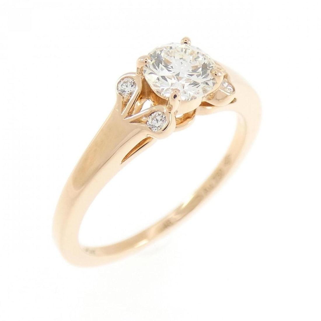 Cartier Ballerina Ring 0.38CT H VS1 3EXT: --- Catalog ---Category: SizeJP Size: 8US Size: 4.5Category: DesignType: Band ringStone: DiamondGender: WomenClarity: VS1Material: Pink gold (18K)Color Grade: HWeight (ct.): 0.38Category: GeneralBrand