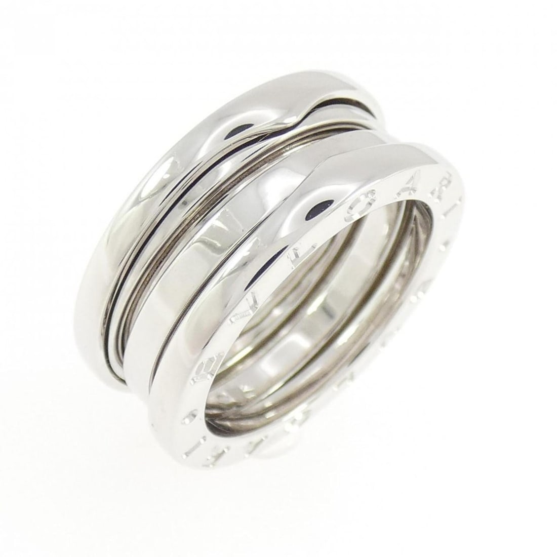 Bvlgari B.zero1 3-band ring: --- Catalog ---Category: SizeUS Size: 5.5Brand Size: 50Category: DesignType: Band ringGender: WomenMaterial: White gold (18K)Category: GeneralBrand: Bvlgari--- Item List ---Section: ConditionRanking: