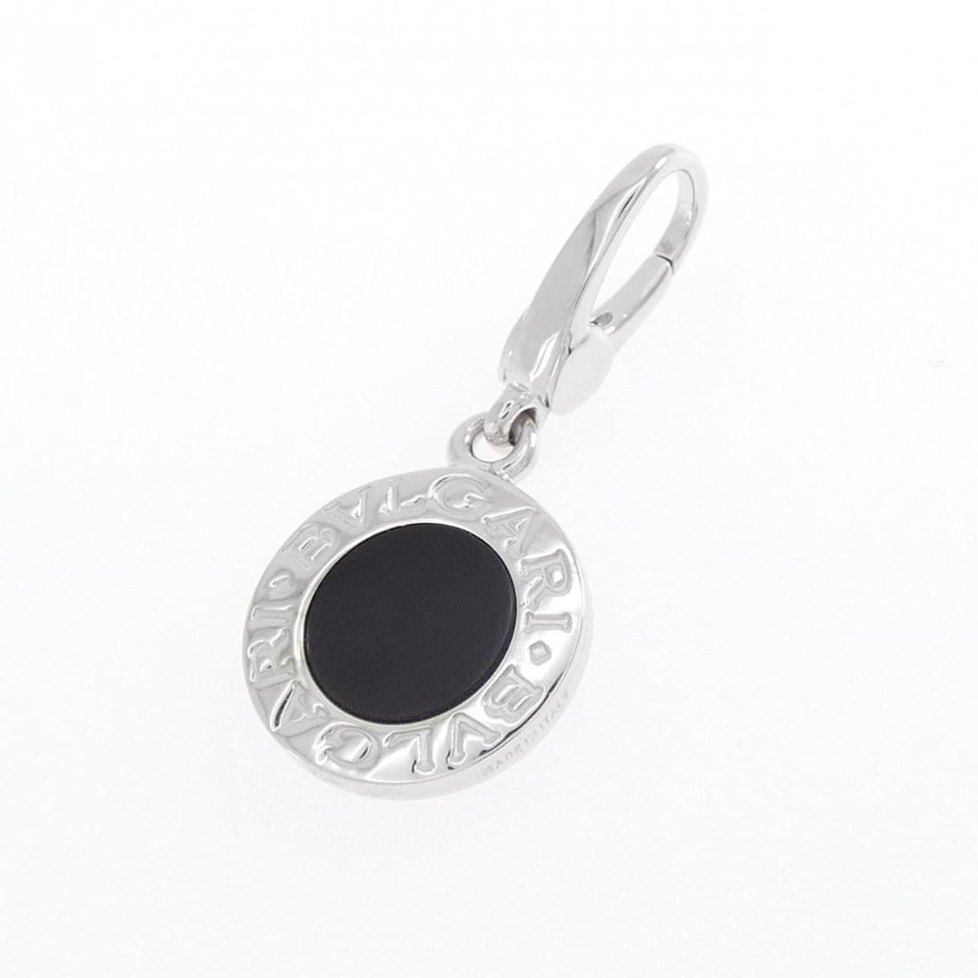 Bvlgari Charm: --- Catalog ---Category: SizeSize (HxWxD): 28.20mm x 13.00mm / 1.11'' x 0.51''Category: DesignType: Necklace charmStone: OnyxGender: WomenMaterial: White gold (18K)Category: GeneralMPN: