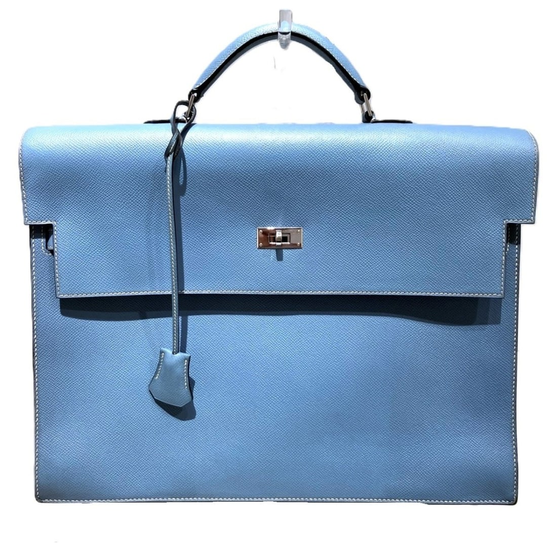 Hermes Kelly Depeches 38 Business Bag, Veau Epsom Leather: --- Catalog ---Category: SizeSize (HxWxD): 29cm x 37.5cm x 7cm / 11.41'' x 14.76'' x 2.75''Handle Length: 17cm / 6.69''Category: DesignType: HandbagColor: Blue jeanGender: WomenClosure: Turn