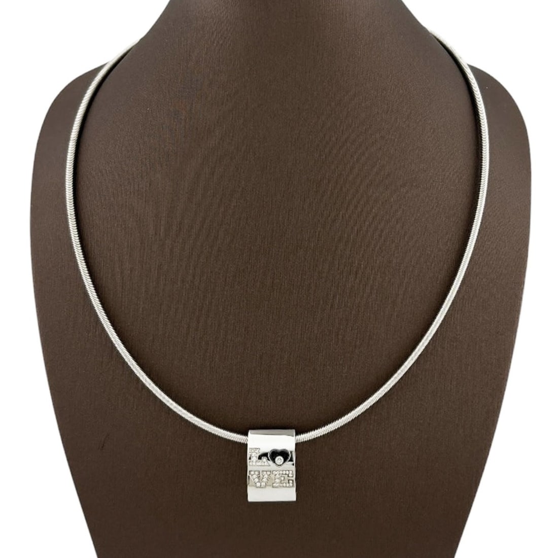Chopard Happy Diamonds Love Necklace, 18K Gold Diamond Necklace for Women: --- Catalog ---Category: SizePendant Size: 19mm x 13.5mm / 0.74'' x 0.53''Neck Circumference: 43 cm / 16.92''Category: DesignColor: SilverGender: WomenMaterial: White gold (18K)Necklace Type: Necklace