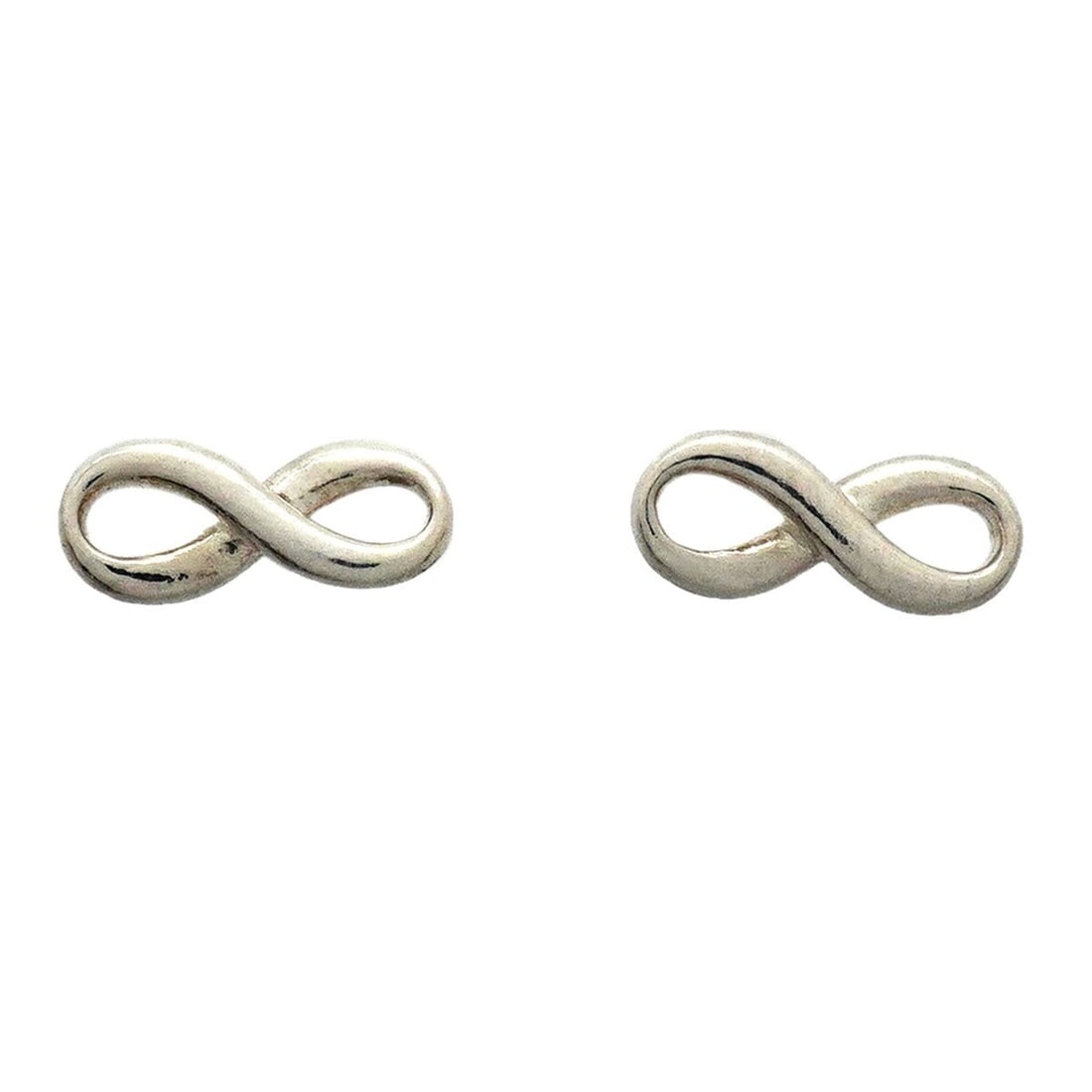 Tiffany & Co. Infinity Sterling Silver Earrings for Women: --- Catalog ---Category: SizeSize (HxWxD): 4.70mm x 10.80mm / 0.19'' x 0.43''Category: DesignType: Stud earringsGender: WomenMaterial: Silver 925Category: GeneralBrand: Tiffany--- Item List ---Section