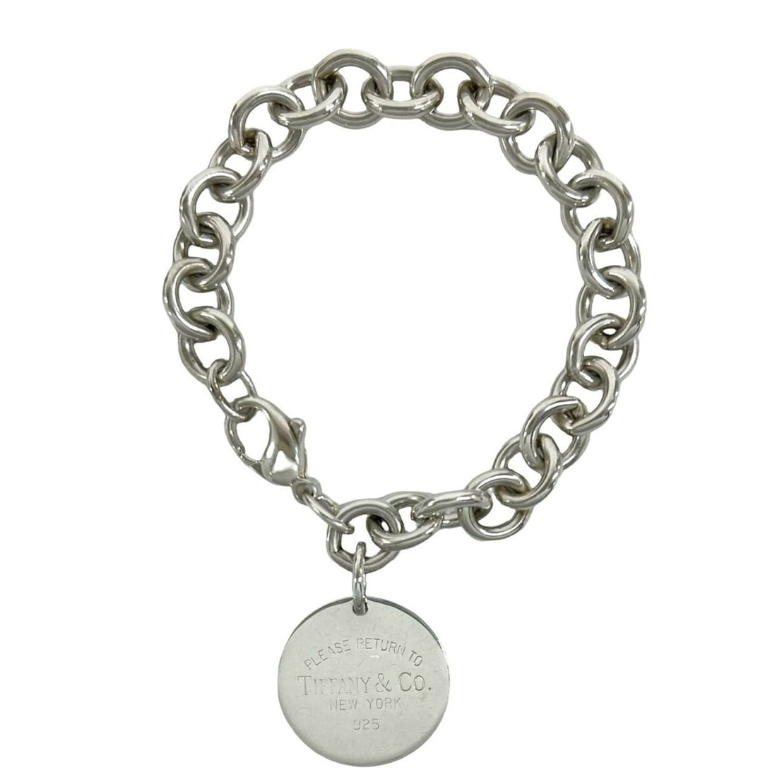 TIFFANY&Co. Tiffany Vintage Return to Round Tag Bracelet, Sterling Silver 925, 33034: --- Catalog ---Category: SizeLength: 16.5cm / 6.49''Category: DesignType: Charm braceletColor: SilverGender: WomenMaterial: Silver 925Category: GeneralBrand: Tiffany--- Item List ---Section: Condition