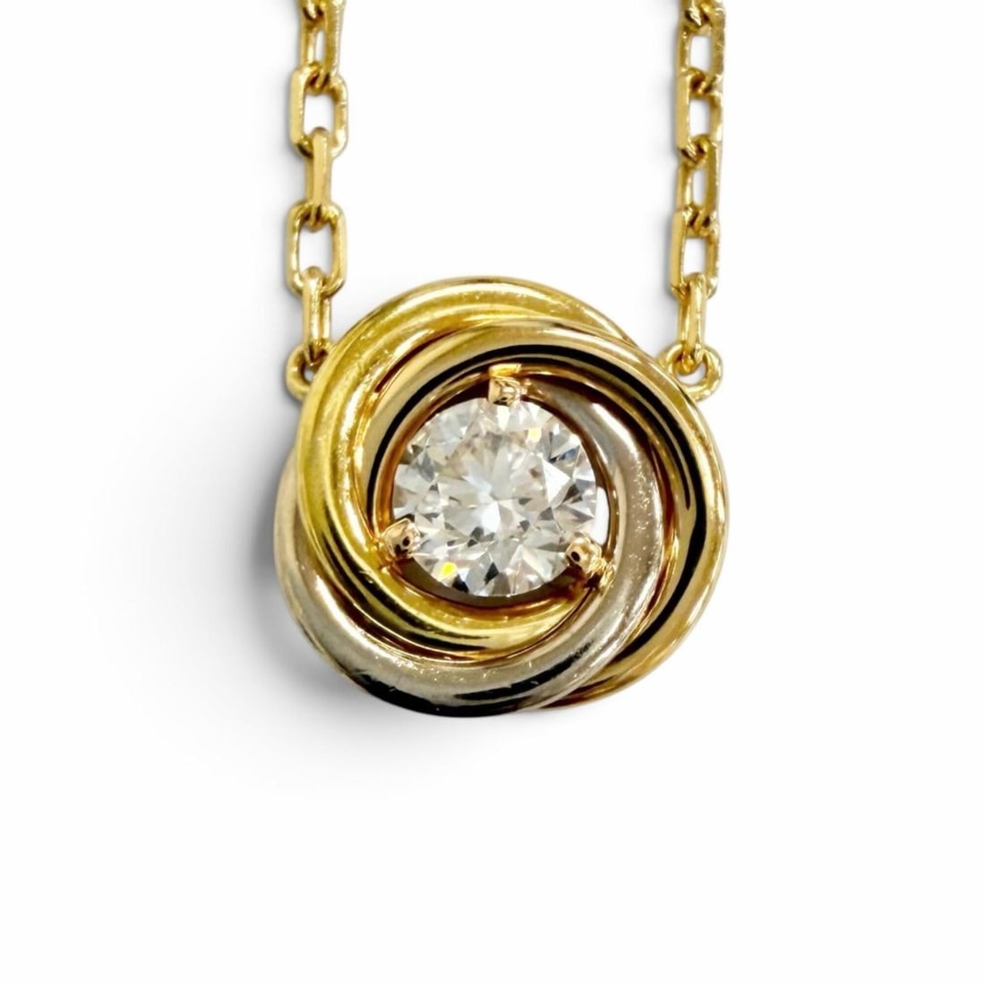 Cartier AYR322 Trinity de Diamond Necklace 0.18ct 750 YG PG Yellow Gold Pink White Weight 2.9g: --- Catalog ---Category: SizePendant Size: 8mm x 8mm / 0.31'' x 0.31''Neck Circumference: 37.5 cm - 40.5 cm / 14.76'' - 15.94''Category: DesignColor: Pink gold, White gold, Yellow goldStone: DiamondGe