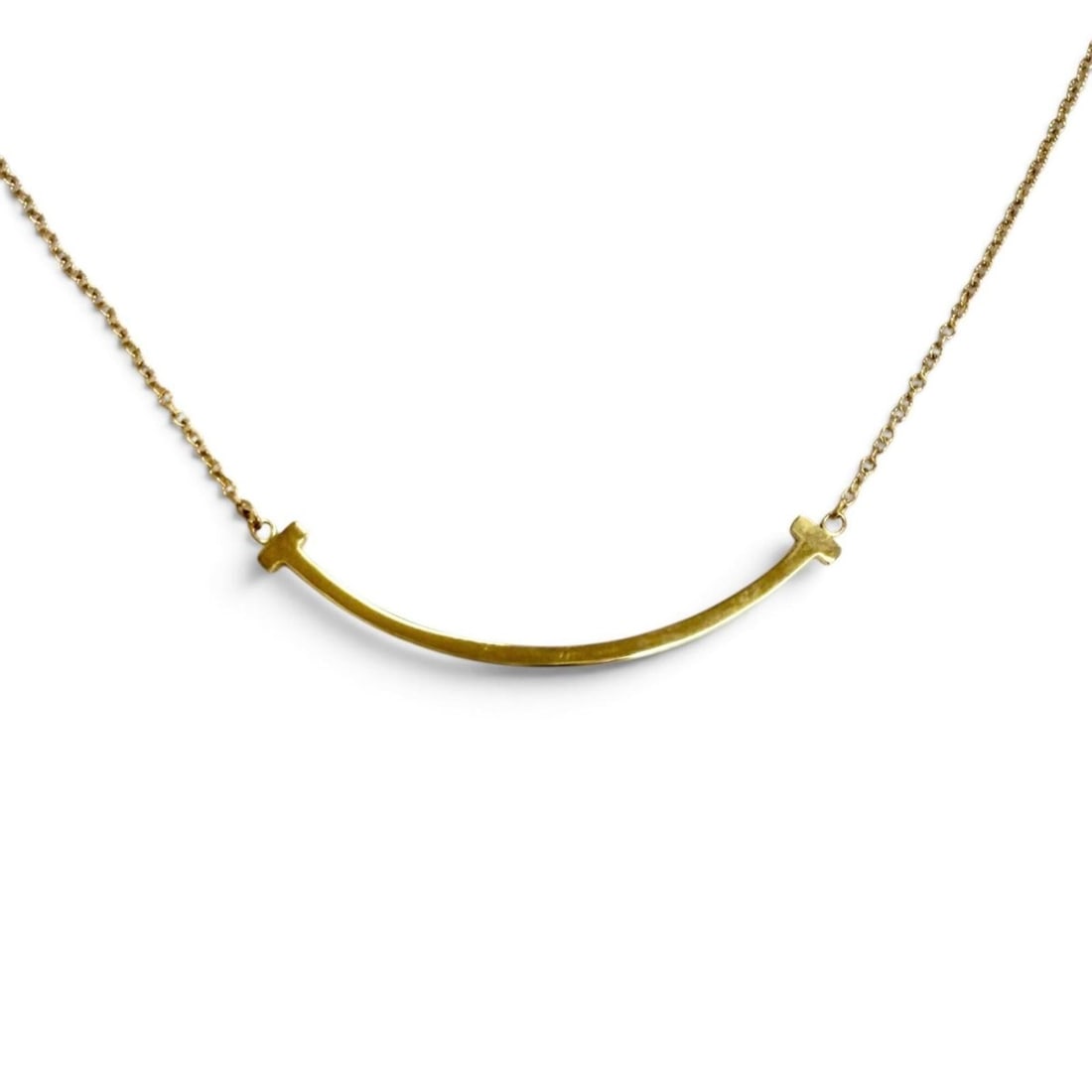TIFFANY&Co. Tiffany T Smile Pendant Small Necklace Accessory A750 (YG) Yellow Gold Weight 2.92g: --- Catalog ---Category: SizePendant Size: 4mm x 37mm / 0.15'' x 1.45''Neck Circumference: 40.5 cm - 46 cm / 15.94'' - 18.11''Category: DesignColor: Yellow goldGender: WomenMaterial: Yellow gold (18K)
