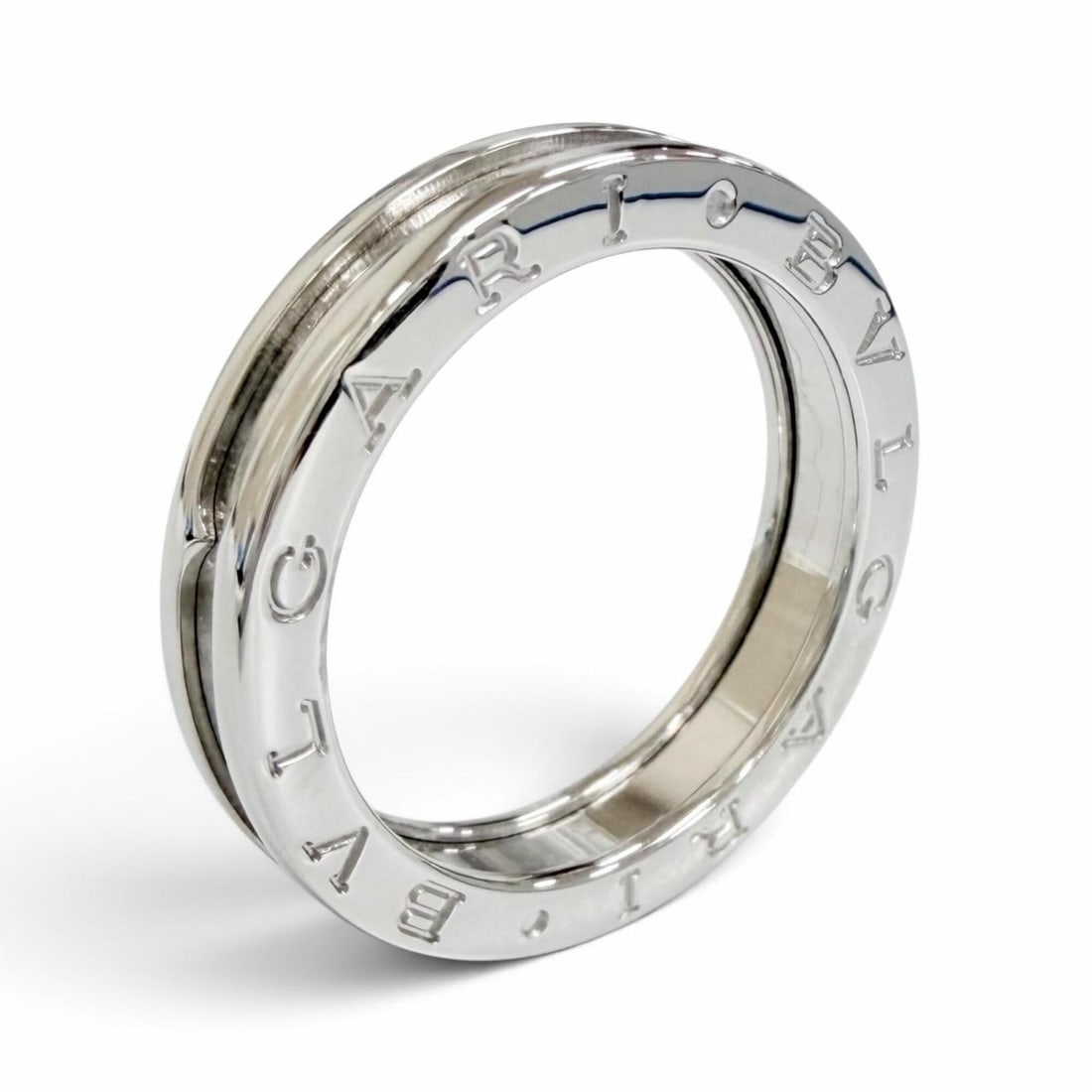 BVLGARI B.zero1 1-band ring, 750 (WG) white gold, size 59, made in Italy, weight 7.83g, men's.: --- Catalog ---Category: SizeUS Size: 9.5Brand Size: 59Category: DesignType: Band ringColor: White goldGender: MenMaterial: White gold (18K)Category: GeneralBrand: BvlgariCountry of Origin: Italy--- I