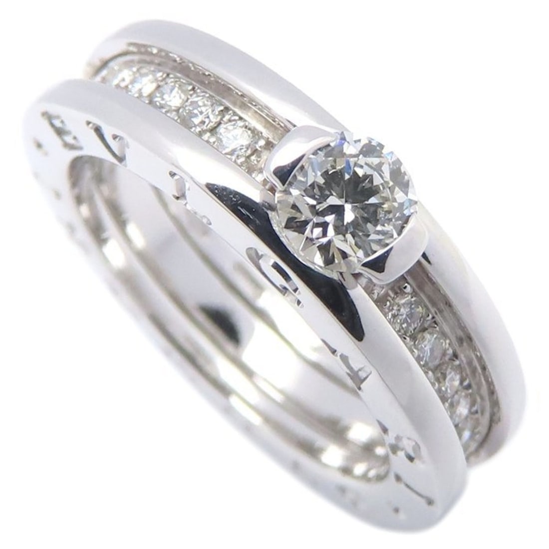 BVLGARI B.zero1 Solitaire Ring, Diamond Size #51, 18K White Gold, Women's, Item Number 295893: --- Catalog ---Category: SizeUS Size: 6Brand Size: 51Category: DesignType: Band ringGender: WomenMaterial: White gold (18K)Category: GeneralBrand: Bvlgari--- Item List ---Section: ConditionRanking: Ra