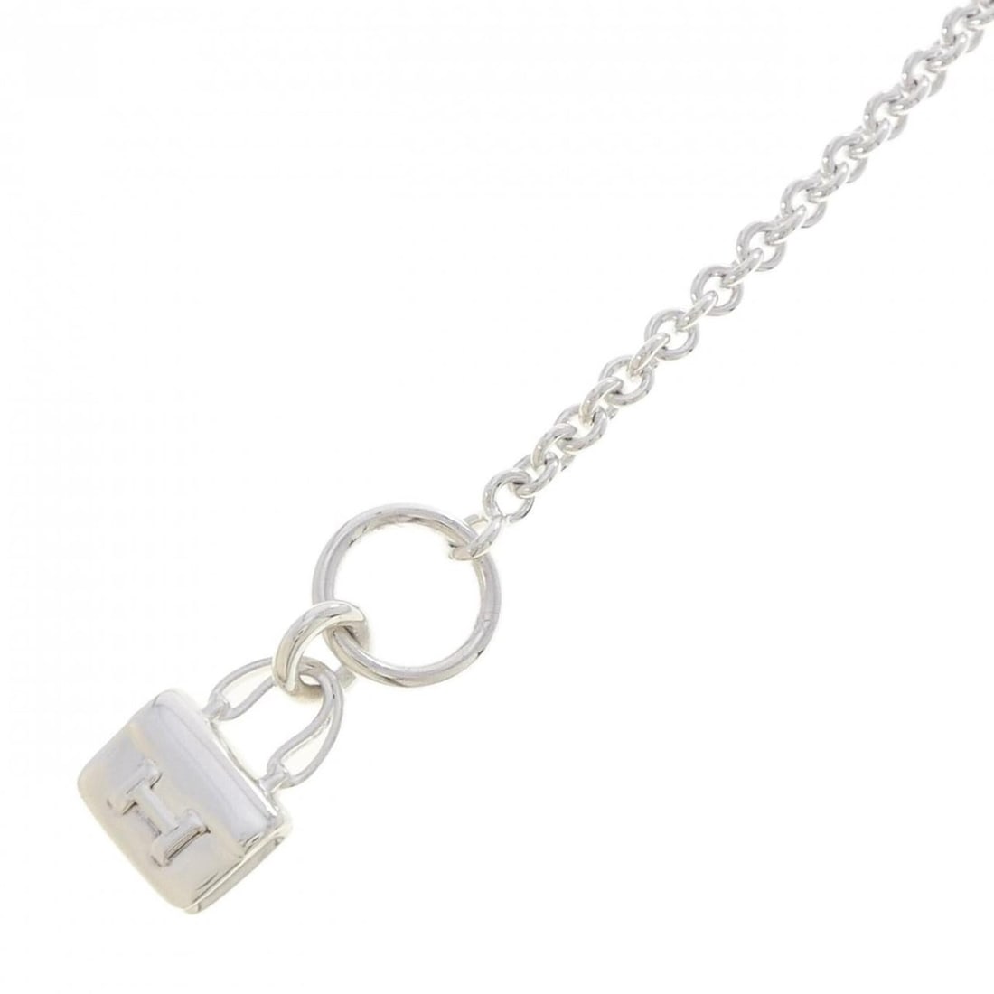 Hermes Amulette Constance Bracelet: --- Catalog ---Category: SizeLength: 17.5cm / 6.88''Category: DesignType: Charm braceletGender: WomenMaterial: Silver 925Category: GeneralBrand: Hermes--- Item List ---Section: ConditionRanking: Rank 