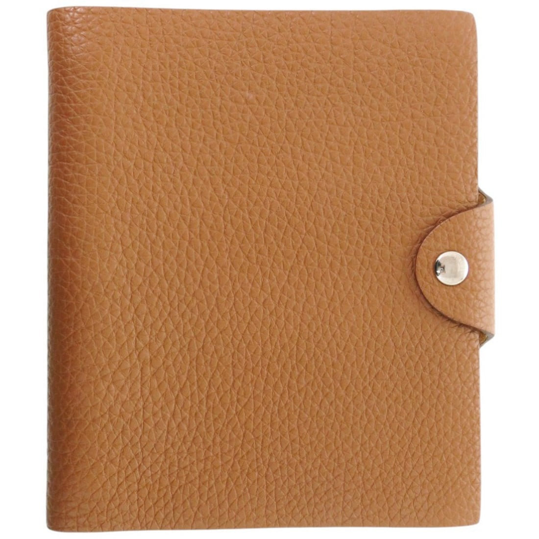Excellent condition Hermes Ulysses PM Togo leather notebook cover in gold with silver hardware, ?O: --- Catalog ---Category: DesignColor: BrownGender: WomenMaterial: Togo leather Category: GeneralBrand: HermesCountry of Origin: FranceCategory: Physical PropertiesSize (HxWxD): 16cm x 13cm x 2cm / 6.2