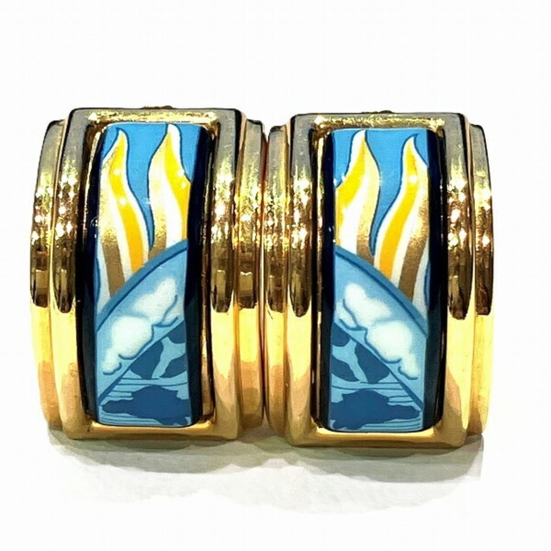 Hermes enamel brand accessories earrings for women: --- Catalog ---Category: SizeWeight: 15.2g / 0.53oz.Size (HxWxD): 21.00mm x 14.00mm / 0.83'' x 0.55''Category: DesignType: Clip earringsColor: Blue, White, YellowGender: WomenMaterial: MetalCategory: 