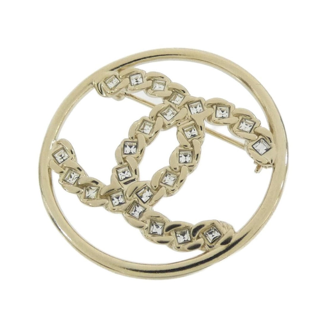 Chanel brooch: --- Catalog ---Category: SizeSize (HxWxD): 3.8cm x 3.8cm / 1.49'' x 1.49''Category: DesignType: BroochColor: Clear, GoldGender: WomenCategory: GeneralBrand: Chanel--- Item List ---Section: