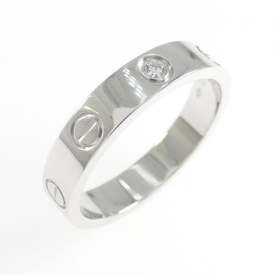 Cartier Mini Love 1P Ring: --- Catalog ---Category: SizeUS Size: 6.5Brand Size: 52Category: DesignType: Band ringGender: WomenMaterial: White gold (18K)Category: GeneralMPN: B4050500Brand: Cartier--- Item List ---Section: