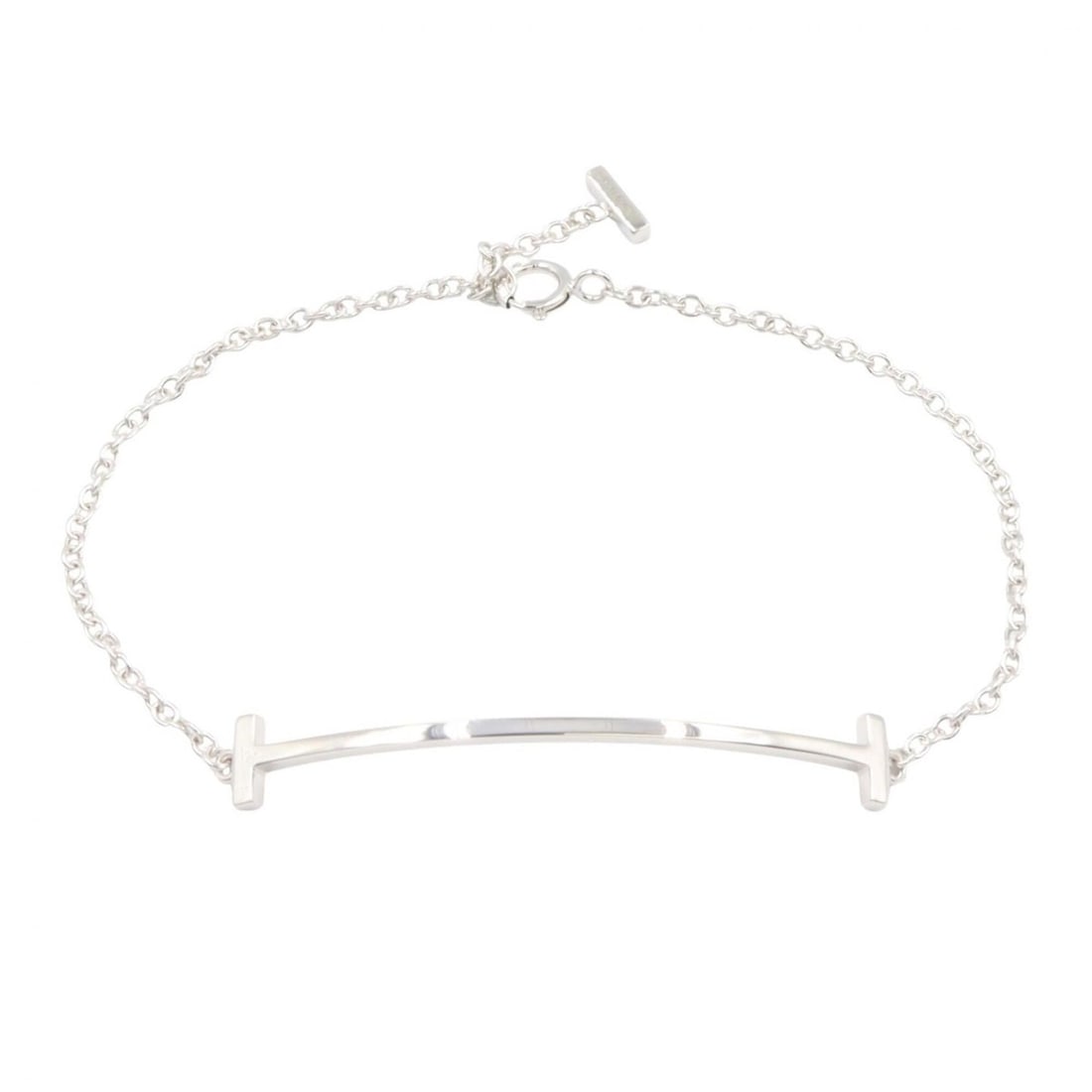 Tiffany & Co. T Smile Small Bracelet, 18K White Gold (WG), Women's, Silver Tone: --- Catalog ---Category: SizeLength: 15cm / 5.9''Weight: 2.4g / 0.08oz.Category: DesignType: Charm braceletColor: SilverGender: WomenMaterial: White gold (18K)Category: GeneralLine: SmileBrand: Tiffan