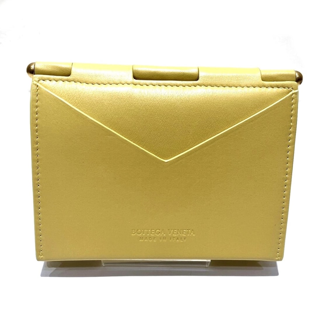 Bottega Veneta Tri-fold Leather Wallet: --- Catalog ---Category: SizeSize (HxWxD): 9.5cm x 12cm x 2cm / 3.74'' x 4.72'' x 0.78''Category: DesignType: Wallet (tri-fold)Color: YellowGender: WomenMaterial: Leather Category: GeneralBrand: Botte