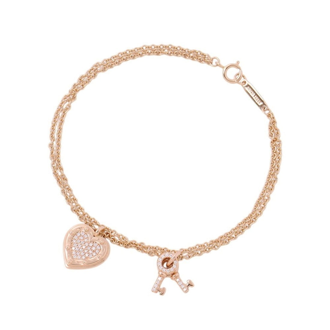 Tiffany & Co. Return to Love Heart Tag Key Diamond Bracelet in 18K Pink Gold. (Tiffany Bracelet): --- Catalog ---Category: SizeLength: 17.5cm / 6.88''Category: DesignType: Charm braceletGender: WomenMaterial: Pink gold (18K)Category: GeneralBrand: Tiffany--- Item List ---Section: ConditionRanking: