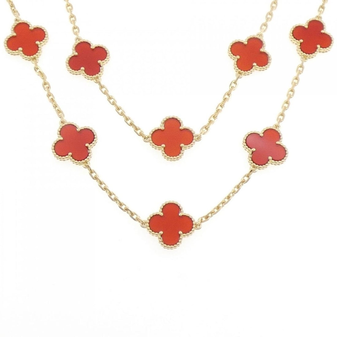 Van Cleef & Arpels Vintage Alhambra 20 Motif Necklace: --- Catalog ---Category: SizeNeck Circumference: 84 cm / 33.07''Category: DesignColor: Yellow goldStone: CarnelianGender: Women,MenMaterial: Yellow gold (18K)Necklace Type: NecklaceCategory: GeneralMP