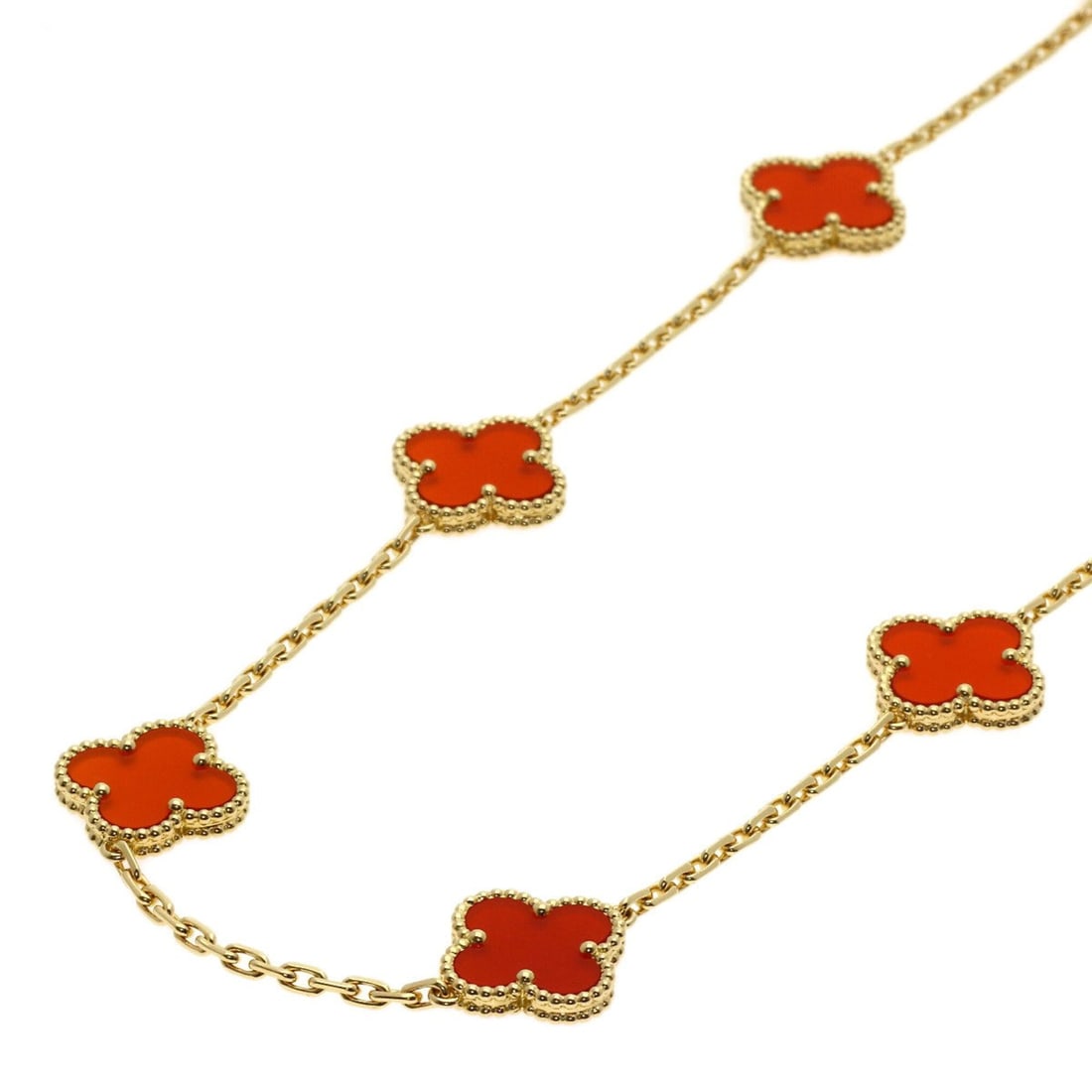 Van Cleef & Arpels Vintage Alhambra Carnelian Necklace, 18K Yellow Gold, Women's: --- Catalog ---Category: SizePendant Size: 14.9mm x 17.6mm / 0.58'' x 0.69''Neck Circumference: 48 cm / 18.89''Category: DesignGender: WomenMaterial: Yellow gold (18K)Necklace Type: NecklaceCategory: 