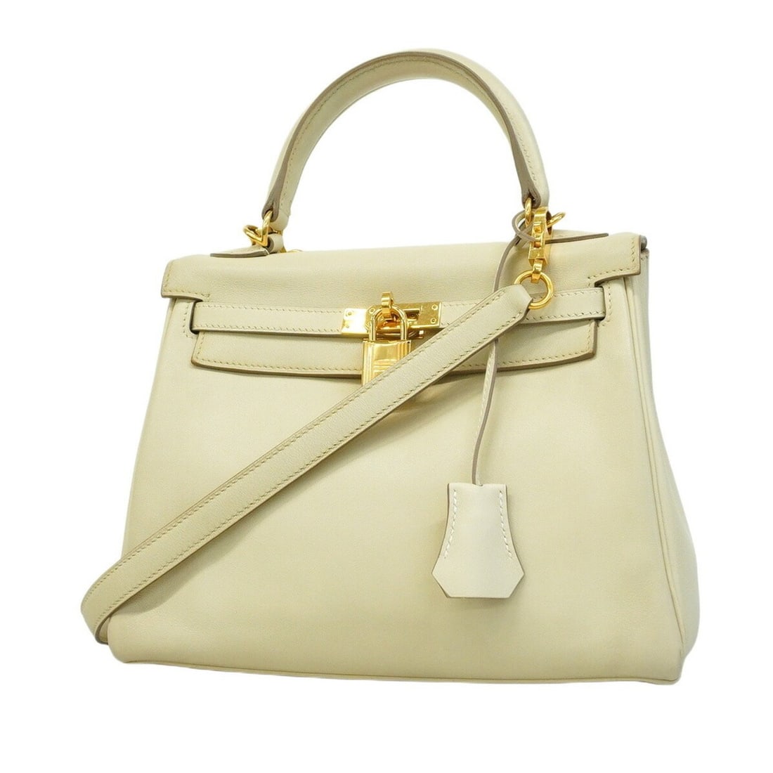Hermes handbag Kelly 25 Swift Cre X engraved ladies: --- Catalog ---Category: SizeSize (HxWxD): 19cm x 23.5cm x 10cm / 7.48'' x 9.25'' x 3.93''Category: DesignType: HandbagGender: WomenMaterial: Swift leather Hardware Color: GoldCategory: GeneralBrand: 