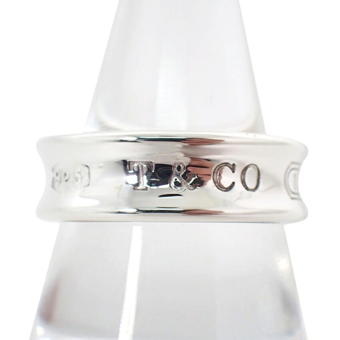 TIFFANY & Co. 925 1837 Ring, Size 16.5: --- Catalog ---Category: SizeUS Size: 8Brand Size: 56Category: DesignType: Band ringGender: WomenMaterial: Sterling silver 925Category: GeneralBrand: Tiffany--- Item List ---Section: ConditionRanking: