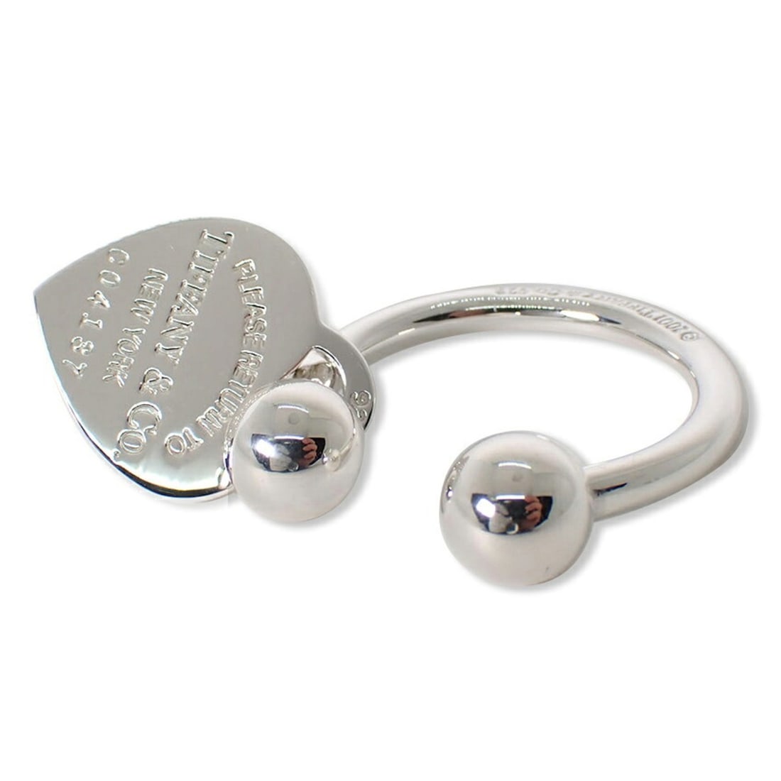 TIFFANY & Co. 925 Return to Tiffany Heart Tag Keyring: --- Catalog ---Category: DesignType: KeyringGender: WomenMaterial: Sterling silver 925Category: GeneralBrand: Tiffany--- Item List ---Section: ConditionRanking: Rank A Used - A few traces of usage, so