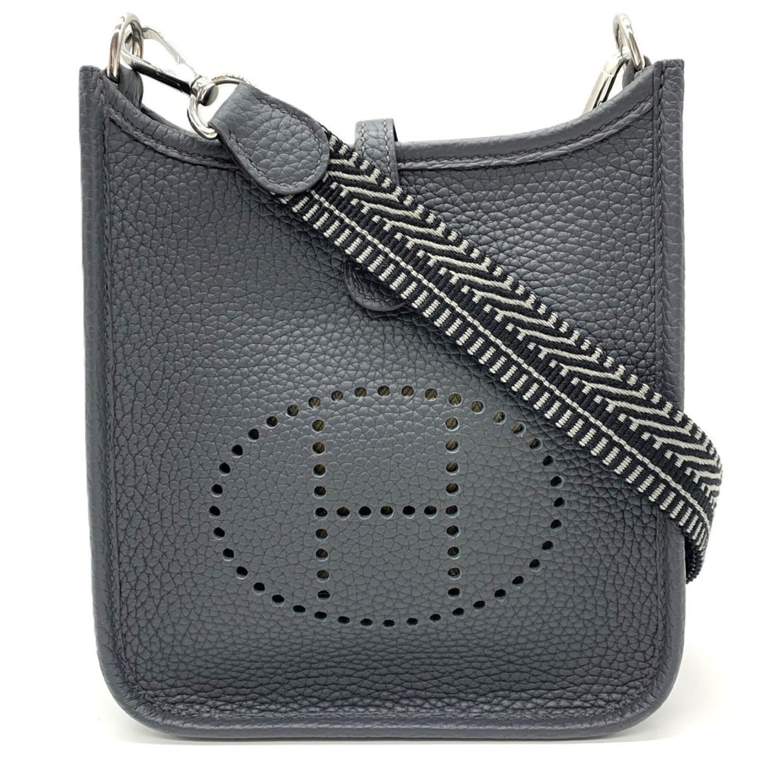 Hermes Evelyne TPM Amazone Gris Misty Grey Taurillon Clemence K Stamp Shoulder Bag HERMES: --- Catalog ---Category: SizeWeight: 250g / 8.81oz.Size (HxWxD): 19cm x 17.5cm x 5.5cm / 7.48'' x 6.88'' x 2.16''Strap Length: 56cm / 22.04''Category: DesignType: Shoulder bagColor: GrayGender: WomenM