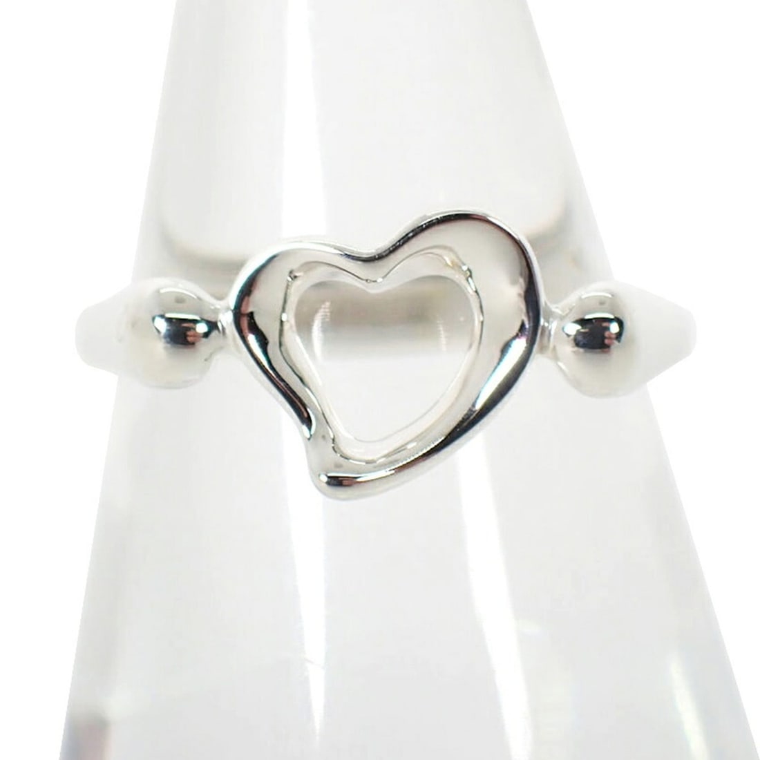TIFFANY & Co. 925 Heart Ring, Size 12: --- Catalog ---Category: SizeUS Size: 6.5Brand Size: 52Category: DesignType: Band ringGender: WomenMaterial: Sterling silver 925Category: GeneralBrand: Tiffany--- Item List ---Section: