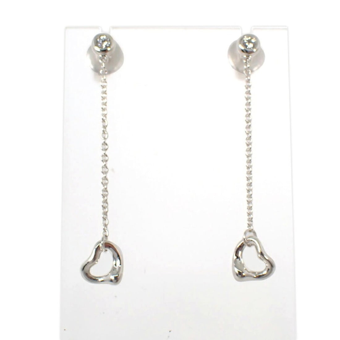 TIFFANY & Co. Ag925 Diamond Heart Earrings: --- Catalog ---Category: DesignType: Stud earringsStone: DiamondGender: WomenMaterial: Sterling silverCategory: GeneralBrand: Tiffany--- Item List ---Section: ConditionRanking: Rank A Used - A few