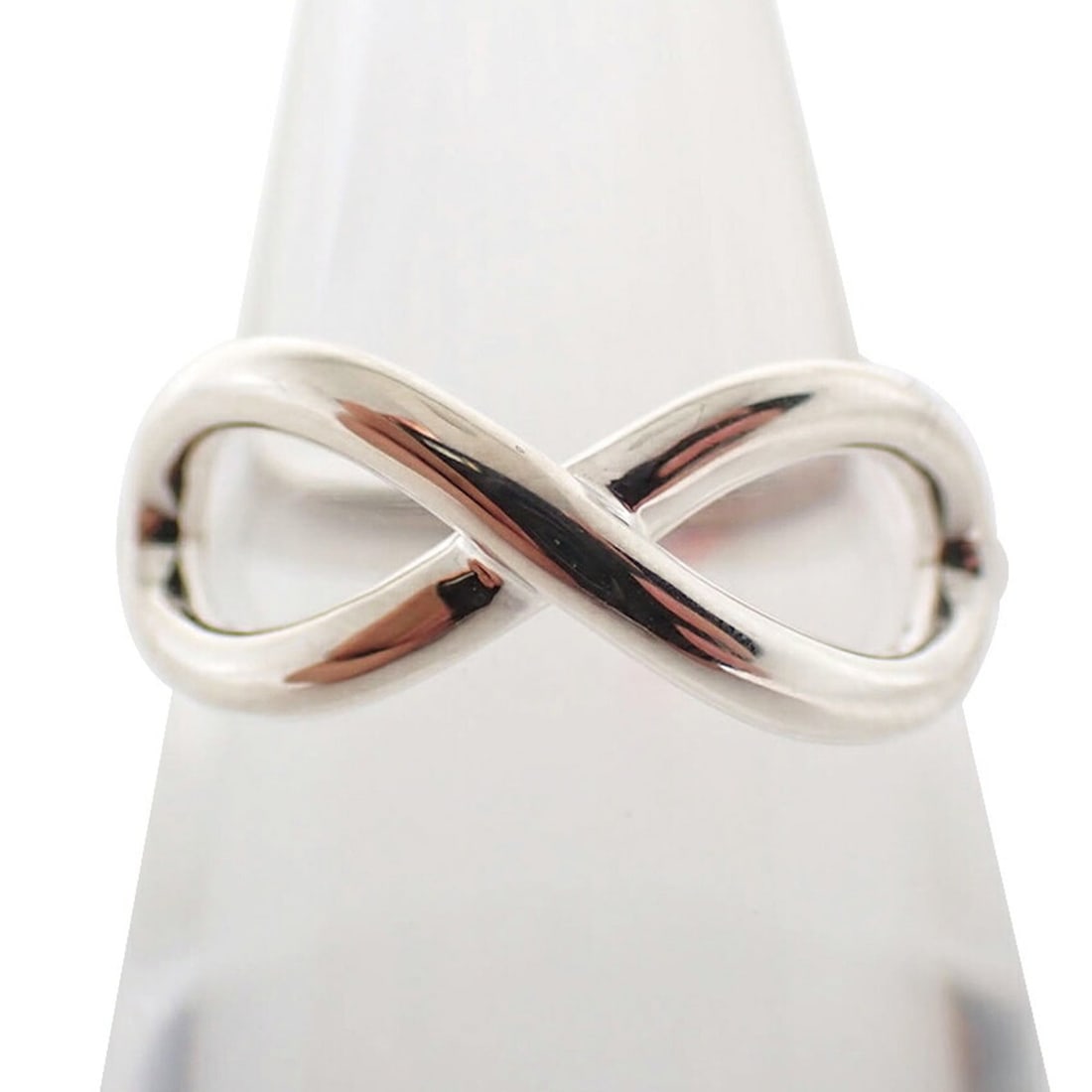TIFFANY & Co. 925 Infinity Ring, Size 9: --- Catalog ---Category: SizeUS Size: 5Brand Size: 49Category: DesignType: Band ringGender: WomenMaterial: Sterling silver 925Category: GeneralBrand: Tiffany--- Item List ---Section: ConditionRanking: