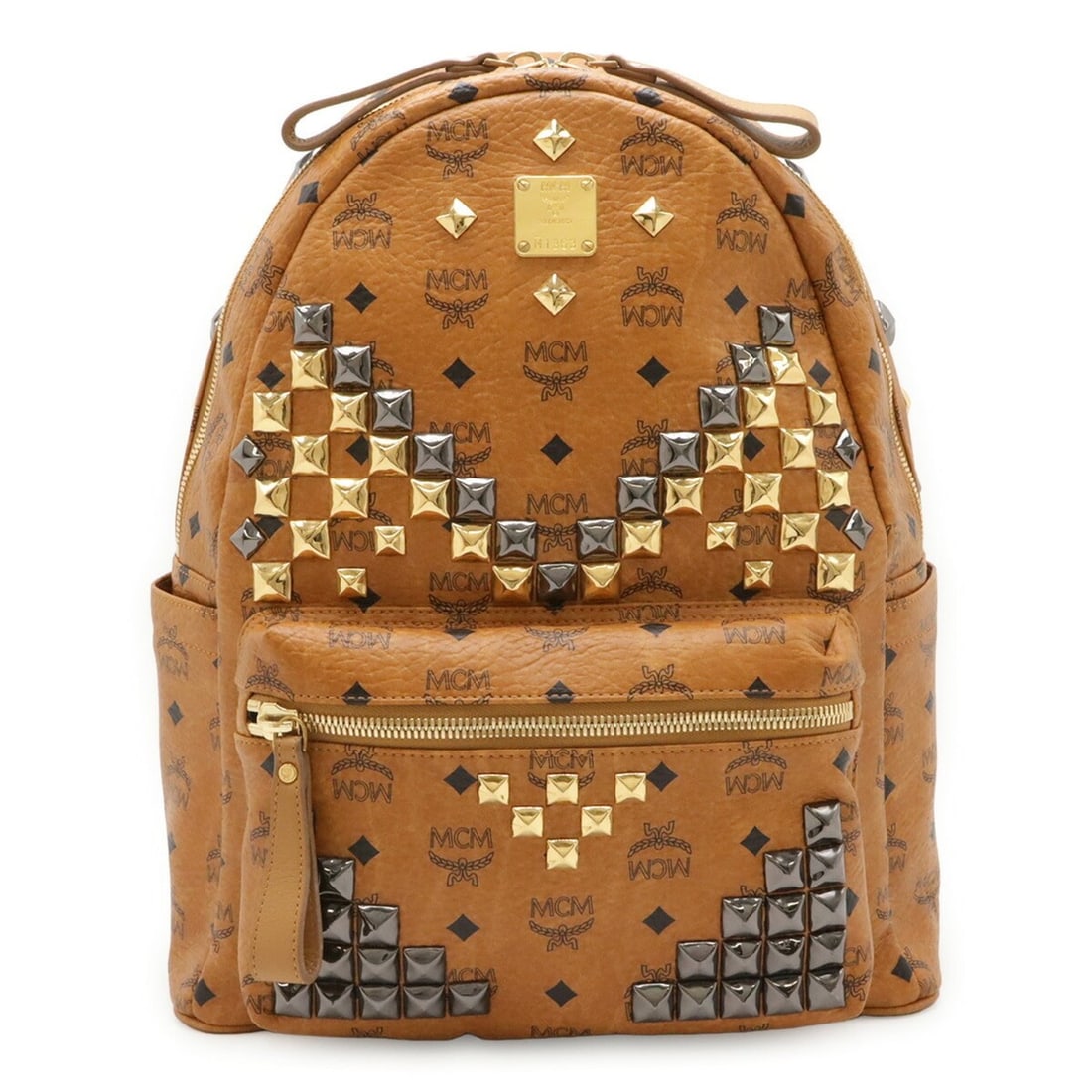 MCM Visetos Glam Backpack, Studded, Cognac Brown MMK3SVE18CO001: --- Catalog ---Category: SizeSize (HxWxD): 38cm x 33cm x 14.5cm / 14.96'' x 12.99'' x 5.7''Category: DesignType: BackpackColor: BrownGender: WomenMaterial: Coated canvas Category: GeneralMPN: MMK3SVE1