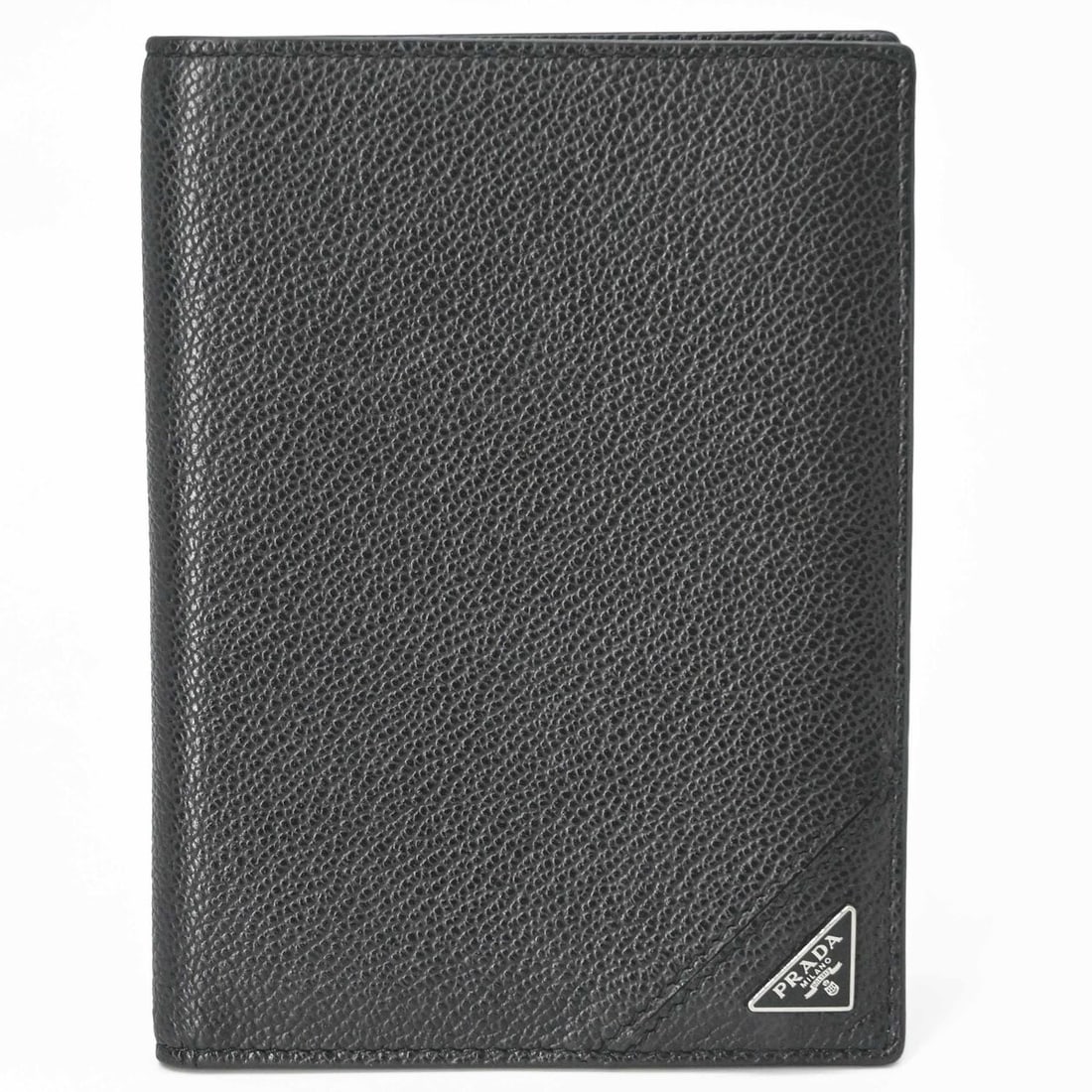 Prada Passport Case Card Saffiano Triangle Leather Black: --- Catalog ---Category: DesignType: Passport coverColor: BlackGender: Women,MenMaterial: Leather Inner Pocket: Card holder 7Category: GeneralBrand: PradaModel: Saffiano Triangle LogoCountry of Origin